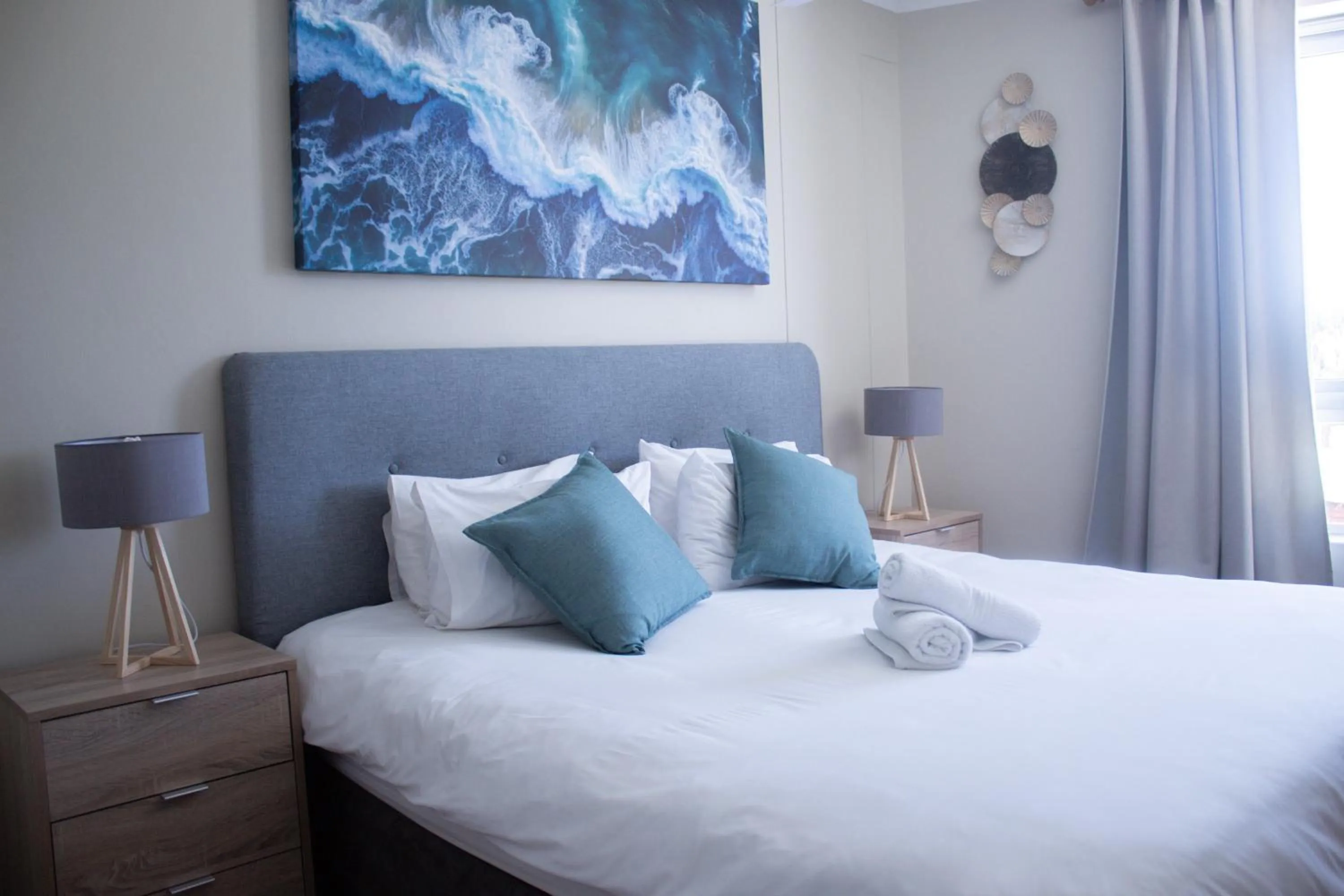 Bedroom, Bed in Ocean Breeze Hotel