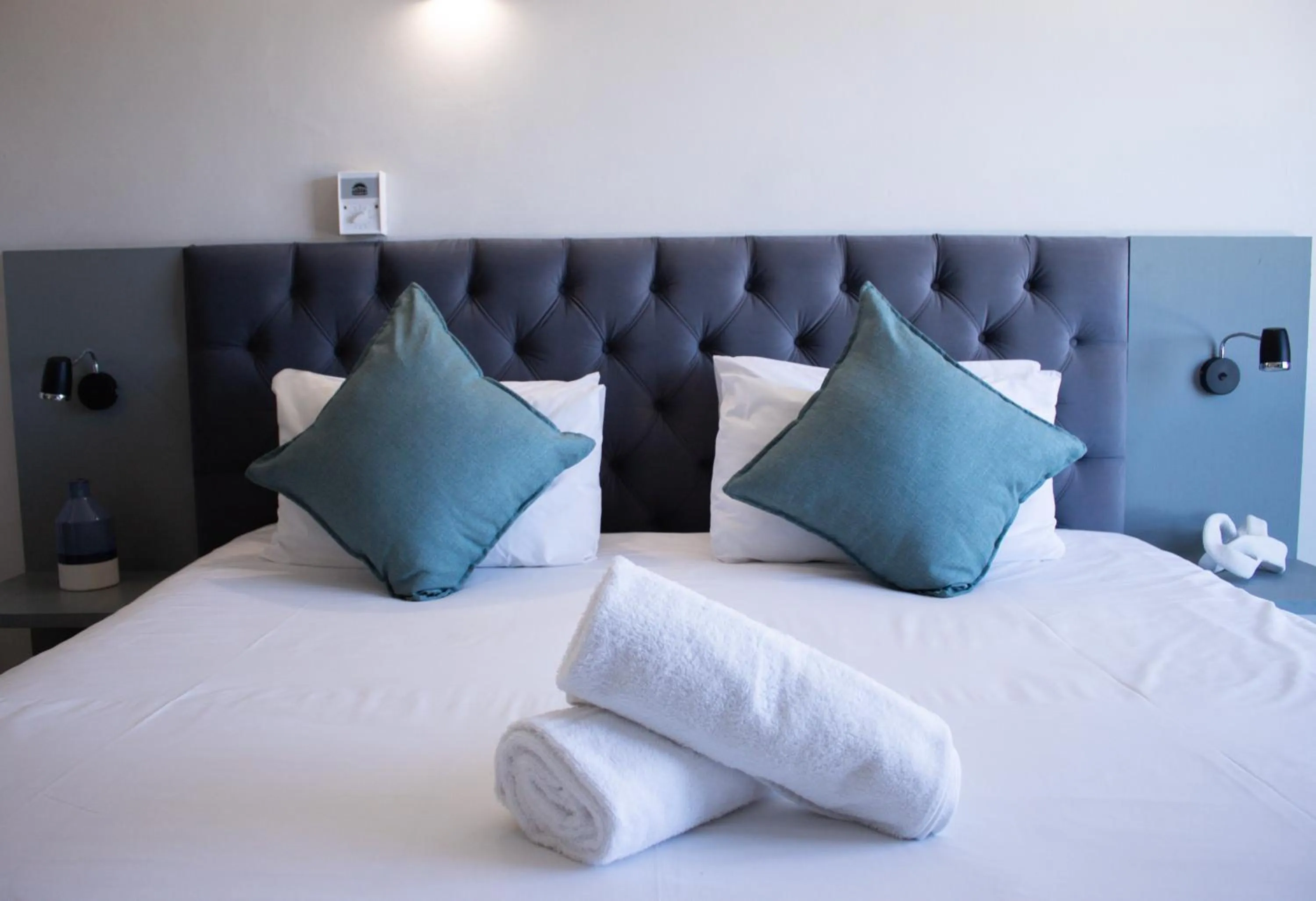 Bed in Ocean Breeze Hotel