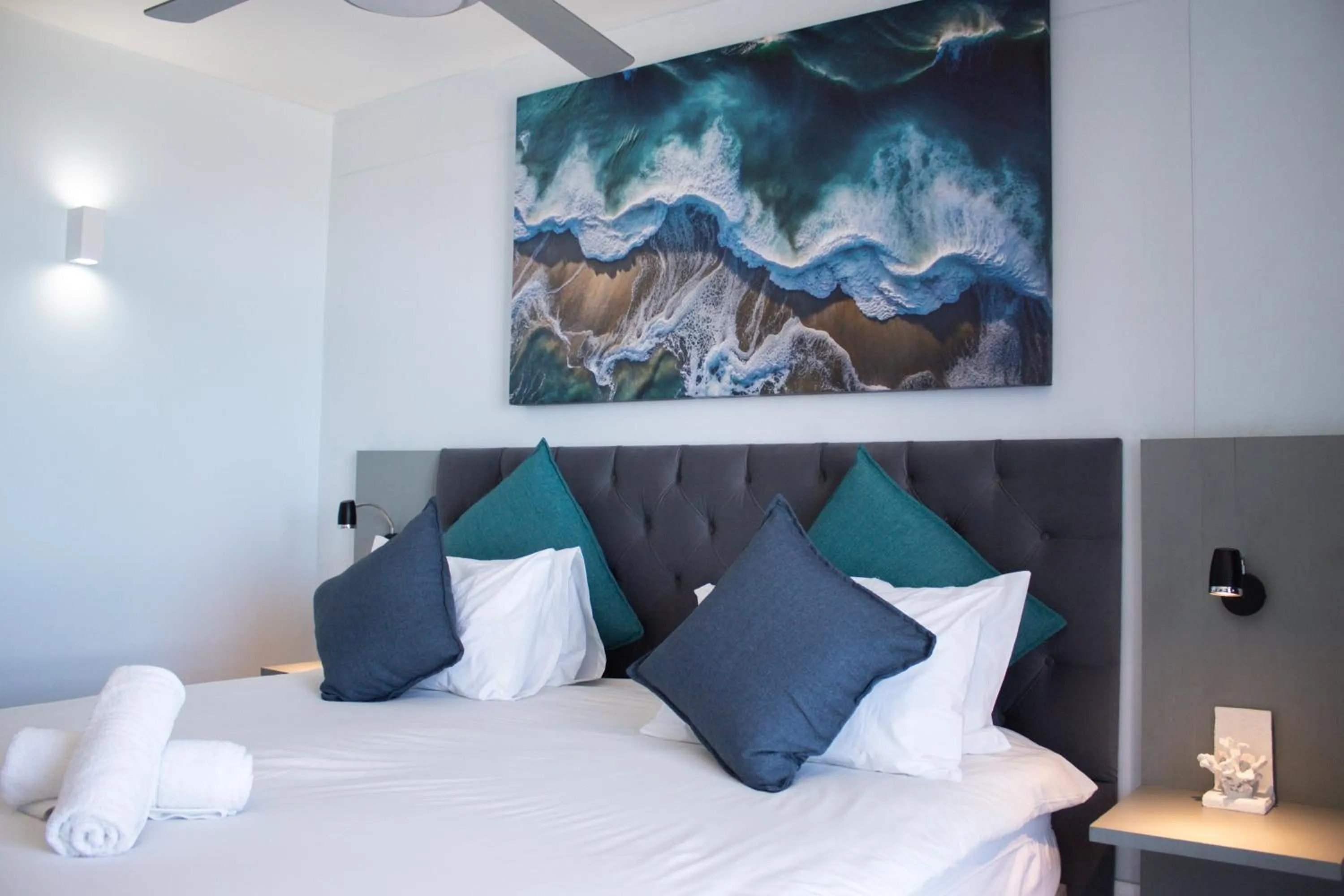 Bed in Ocean Breeze Hotel