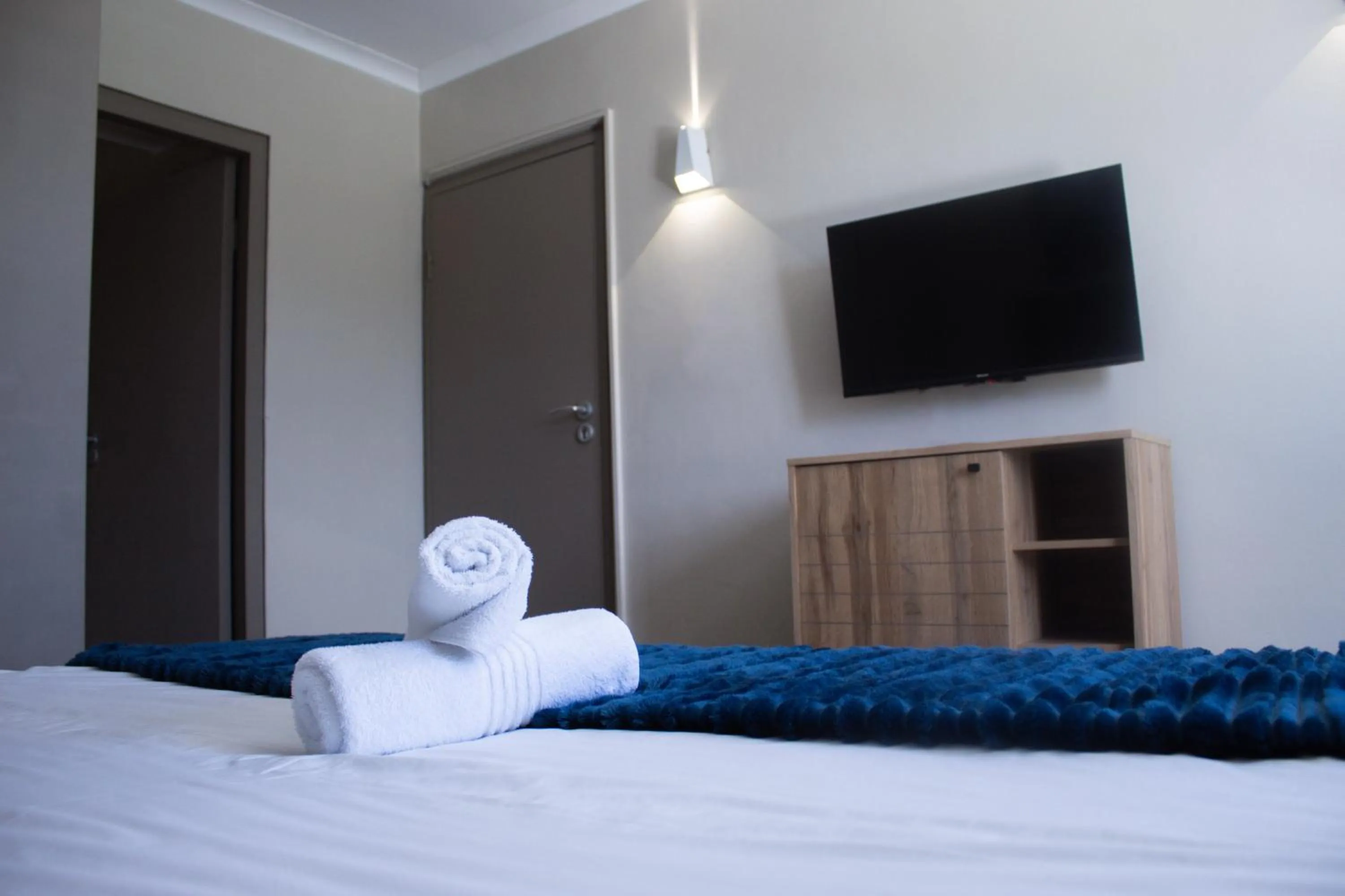 TV and multimedia, Bed in Ocean Breeze Hotel