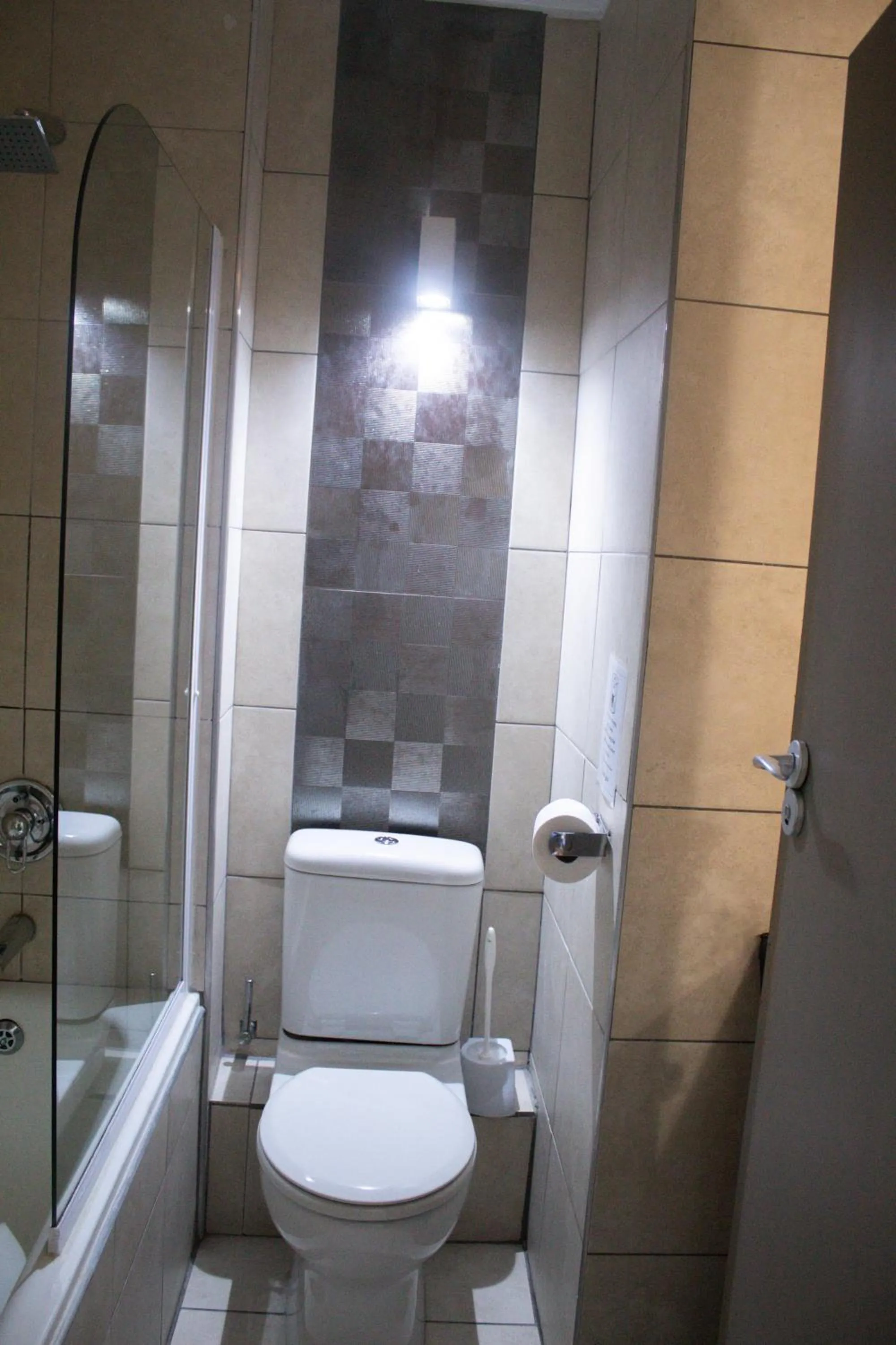Toilet in Ocean Breeze Hotel