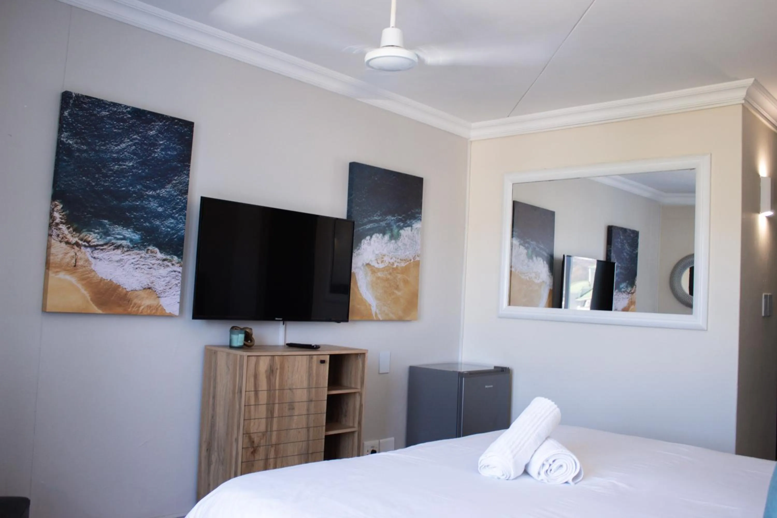 Bed in Ocean Breeze Hotel