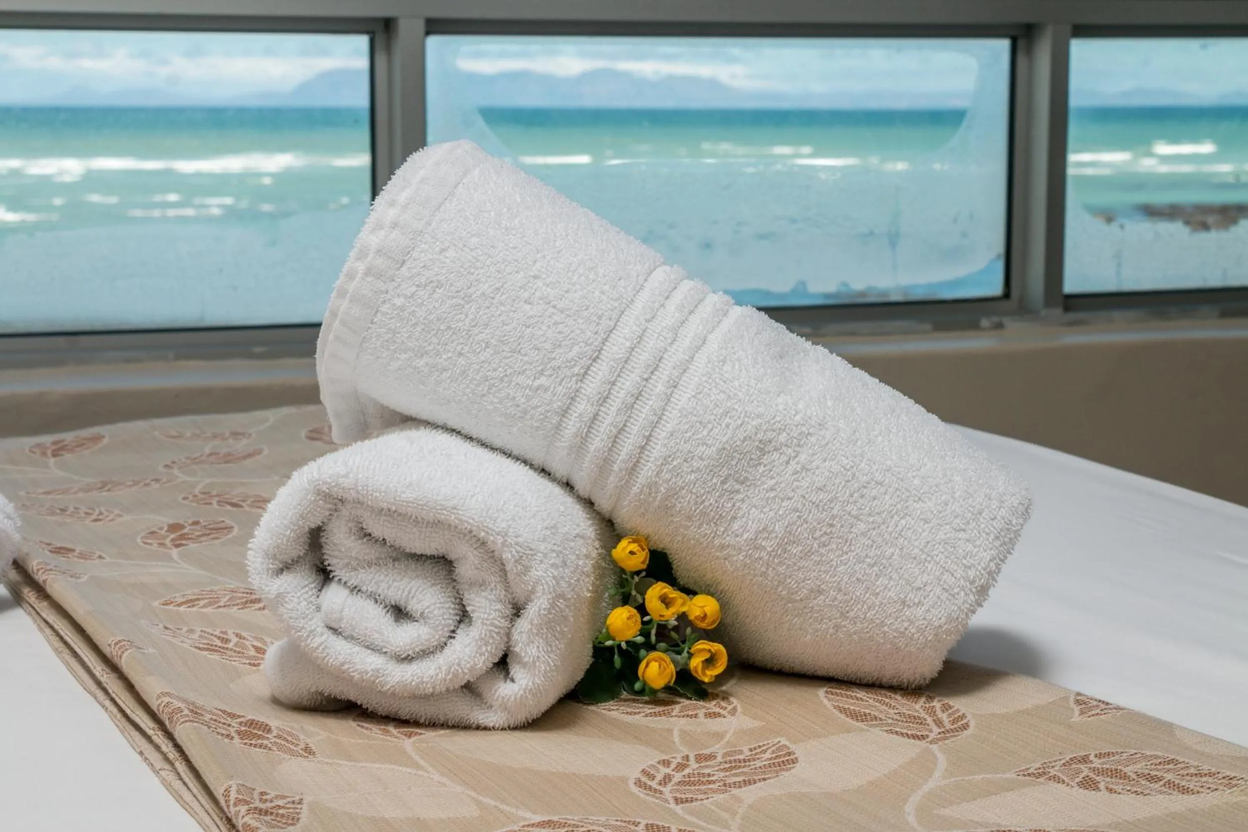 Bed in Ocean Breeze Hotel