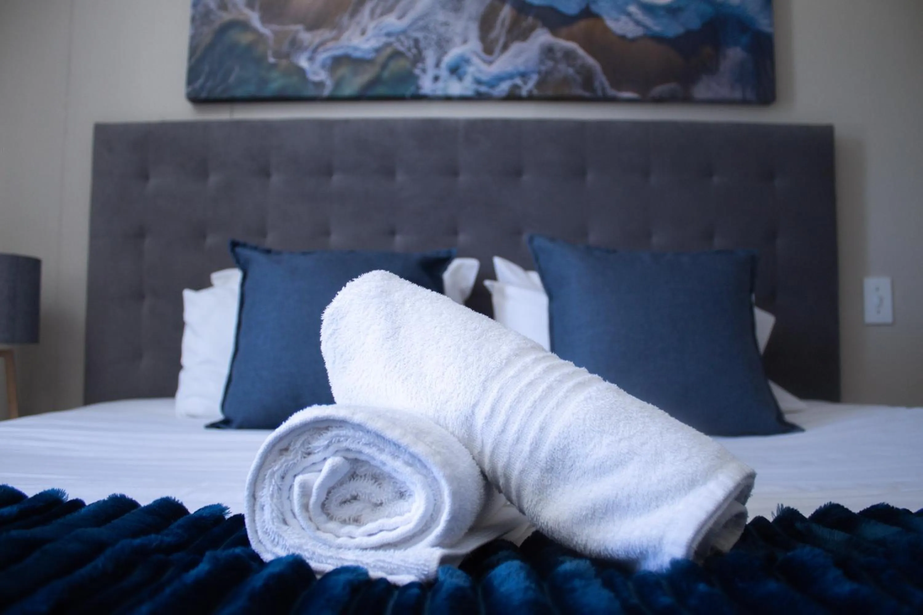 Bed in Ocean Breeze Hotel