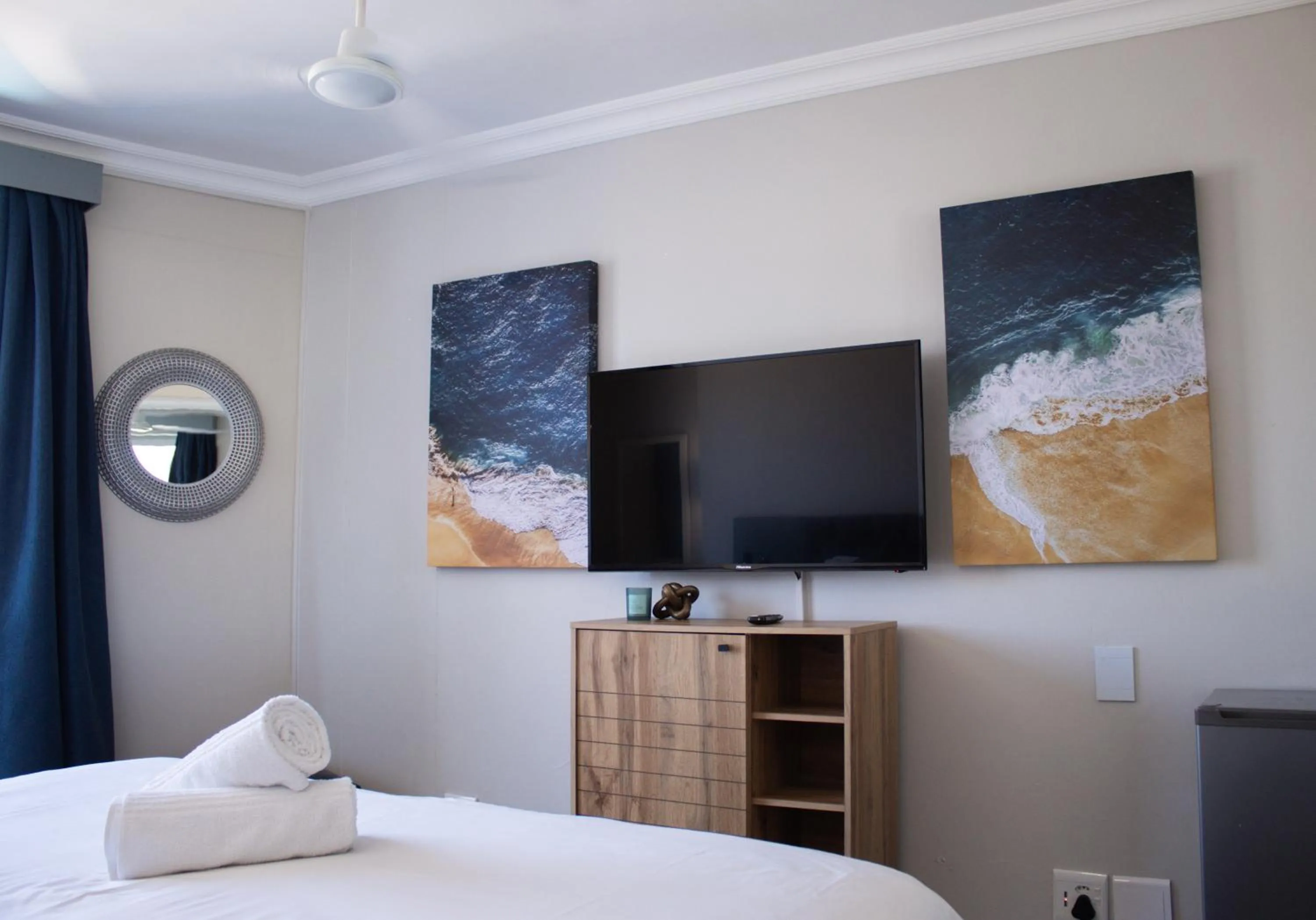 Bed in Ocean Breeze Hotel