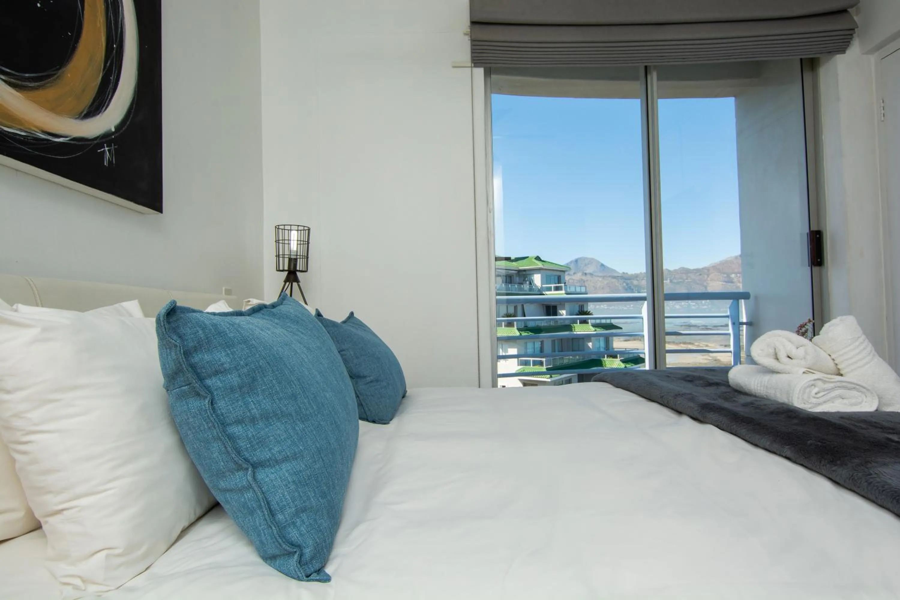 Bed in Ocean Breeze Hotel