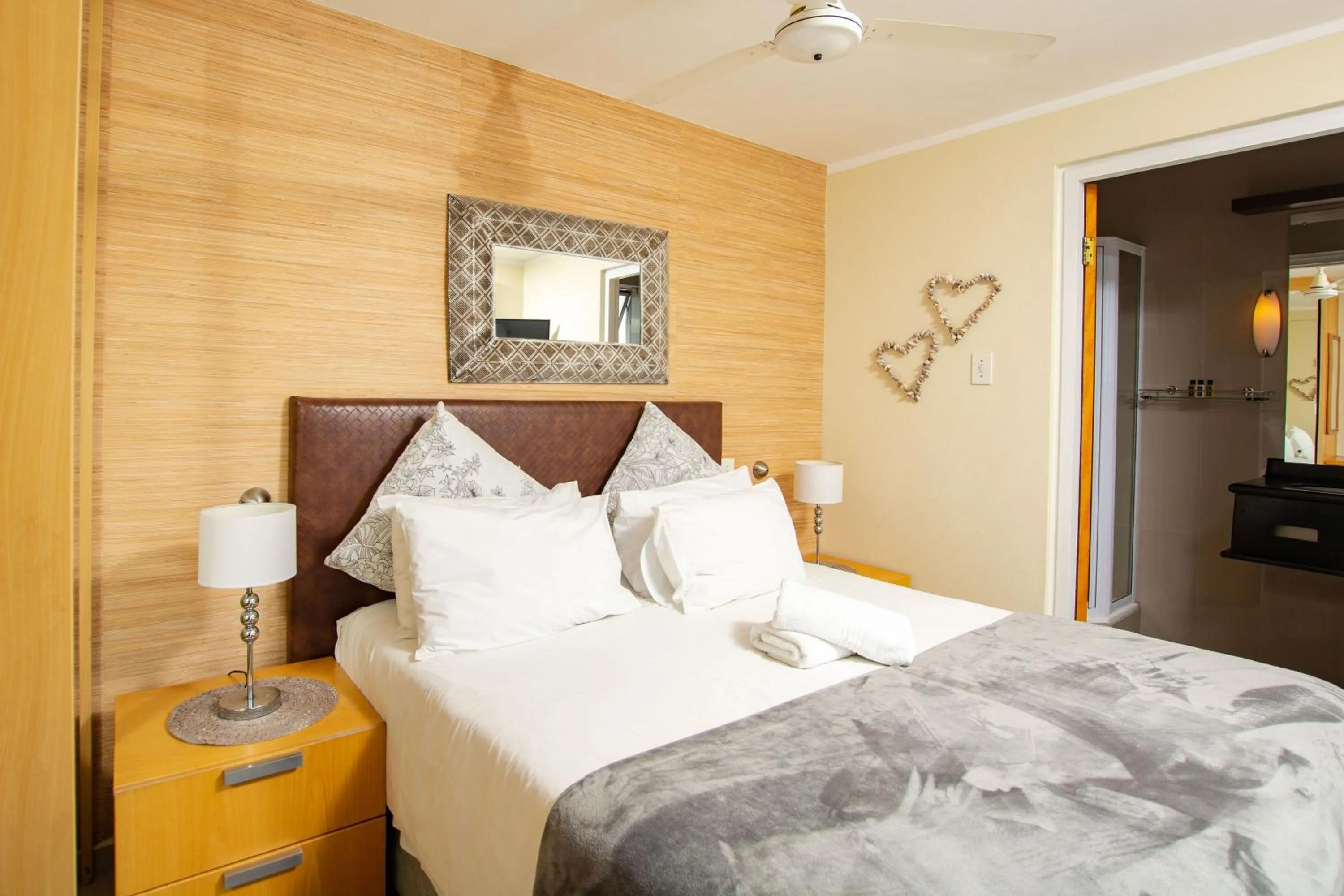 Bed in Ocean Breeze Hotel