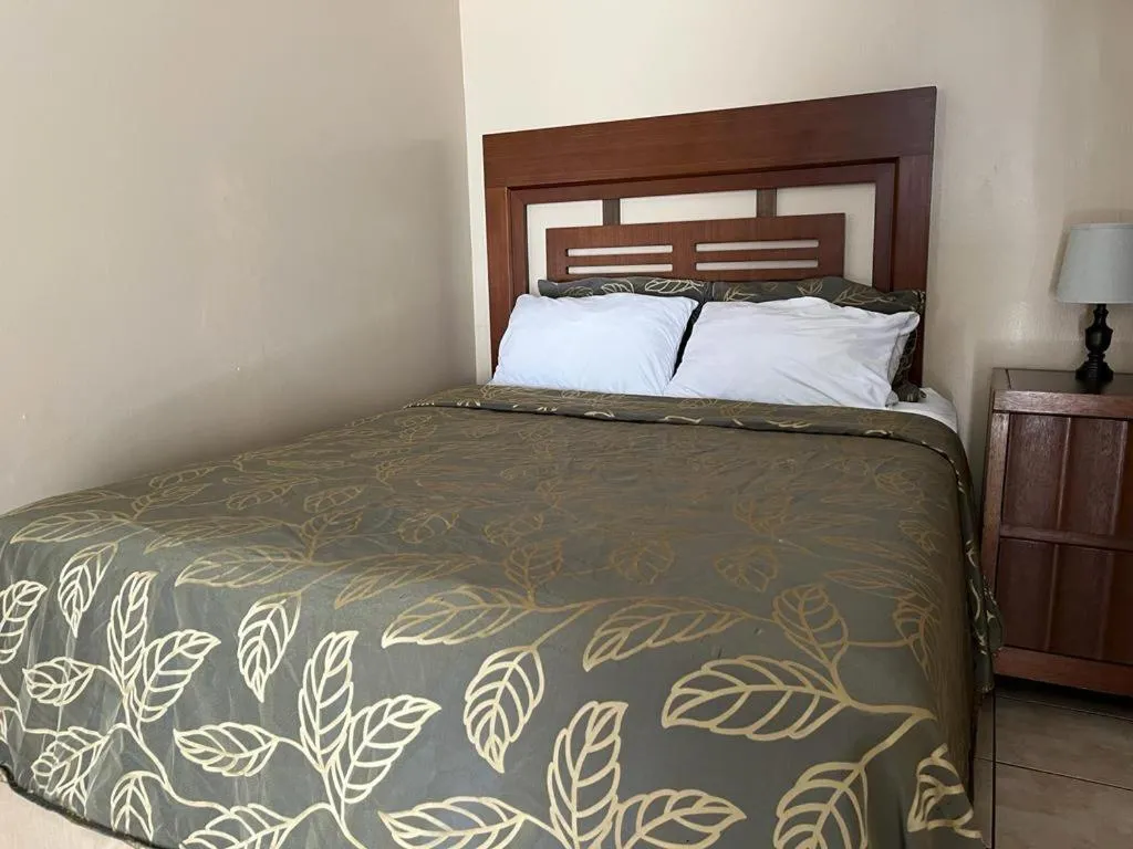 Bed in Del Bosque Tj Inn