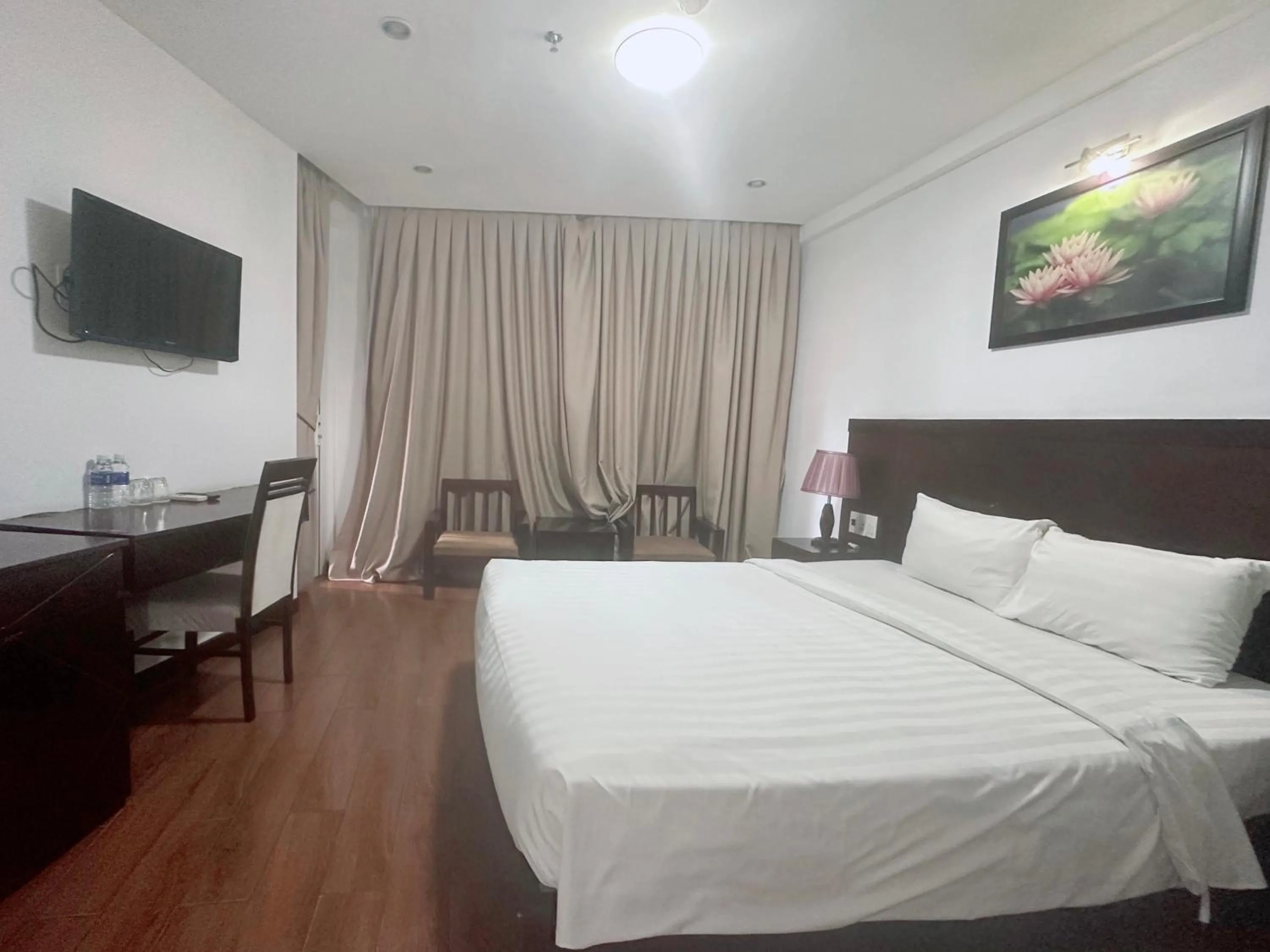 Bed in Dragon Sea Hotel