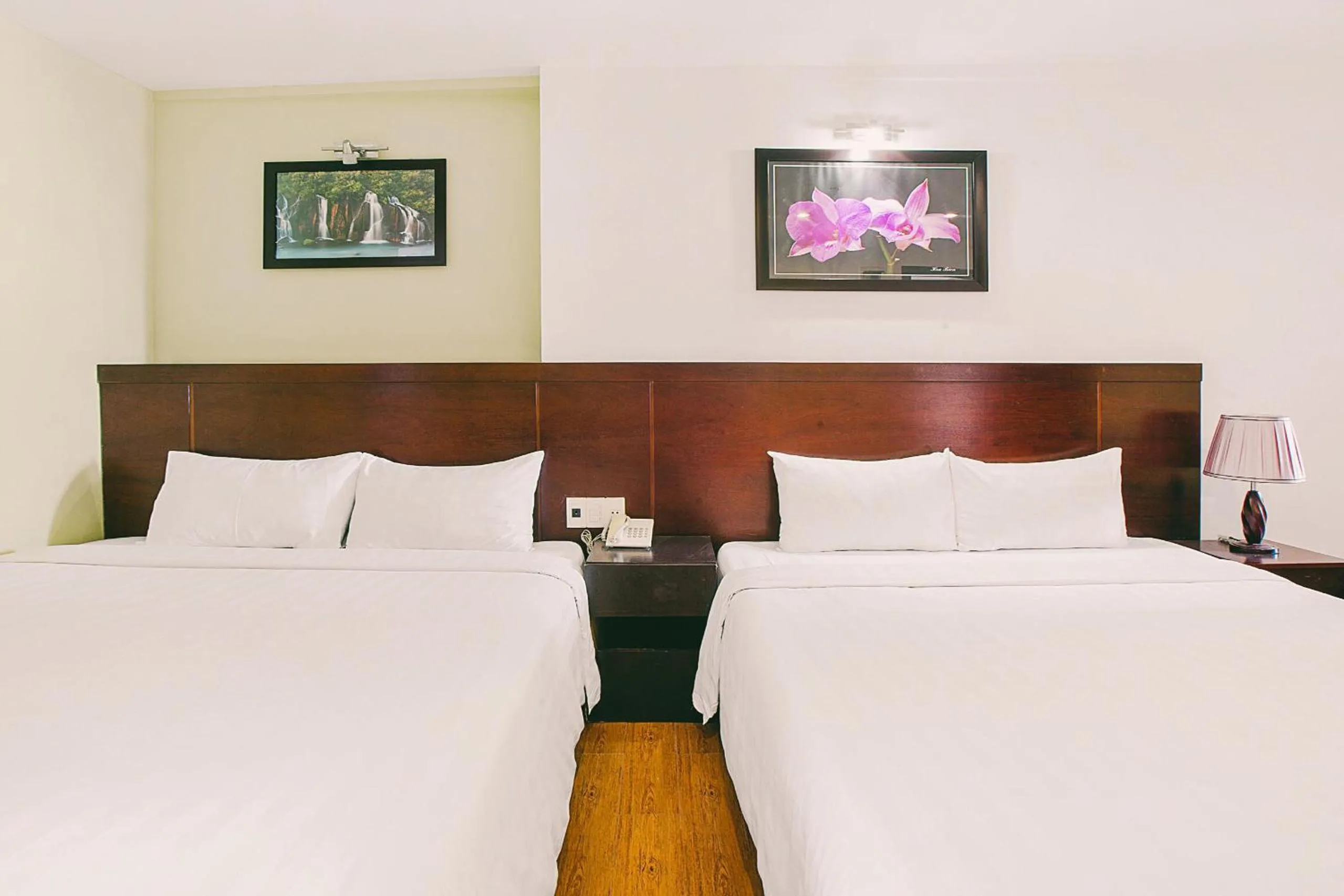 Bed in Dragon Sea Hotel