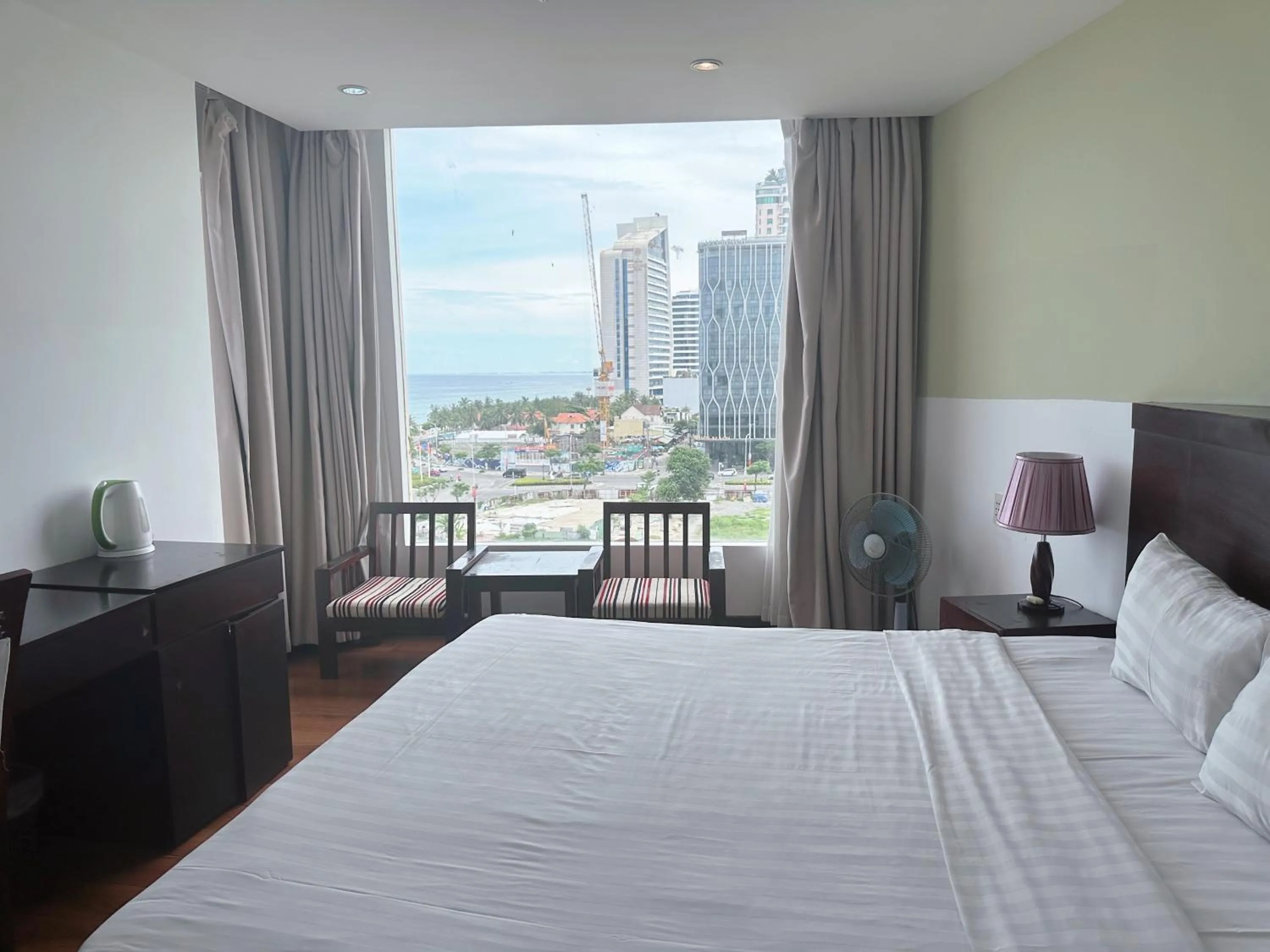 Bed in Dragon Sea Hotel