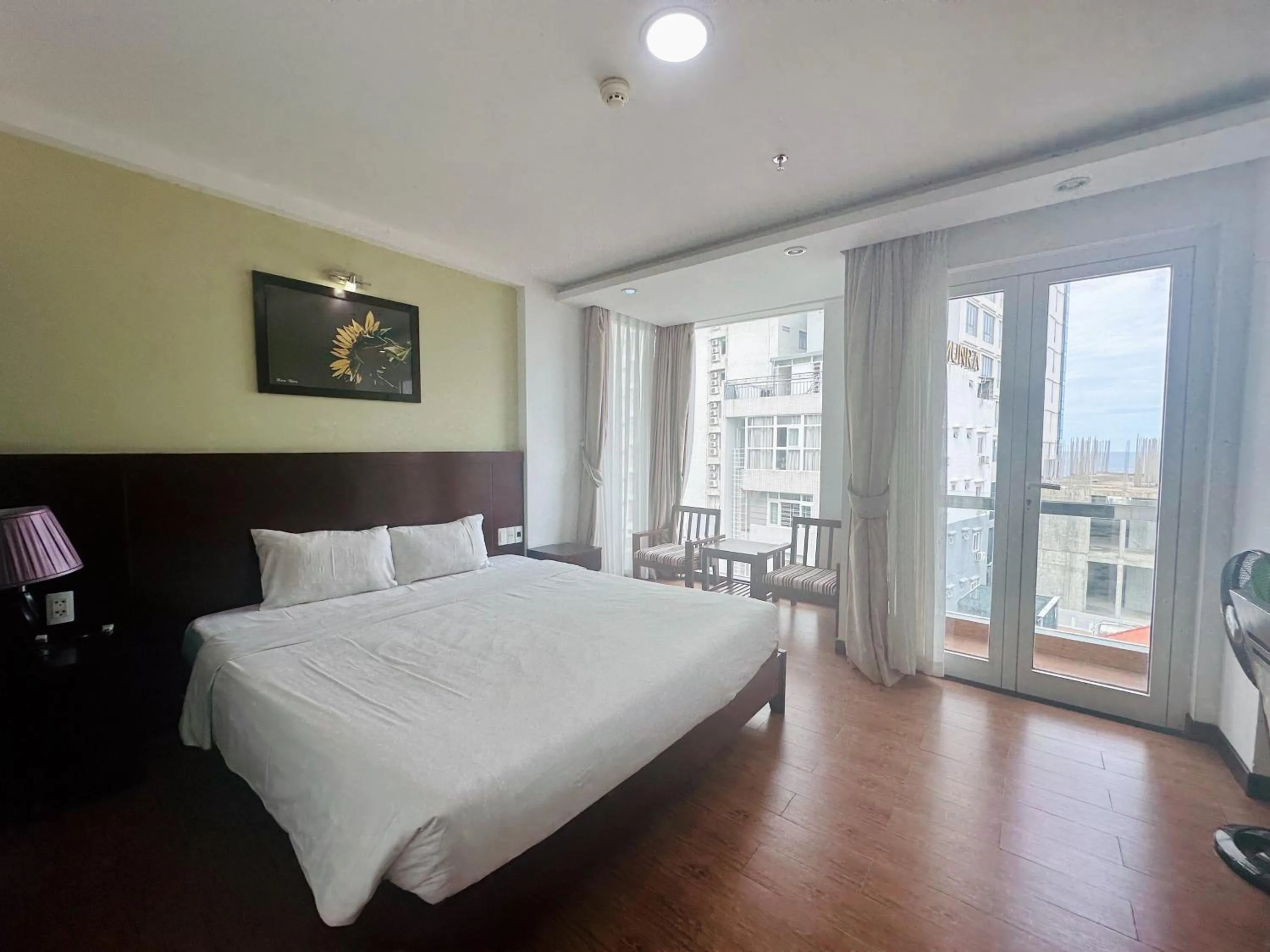 Bed in Dragon Sea Hotel