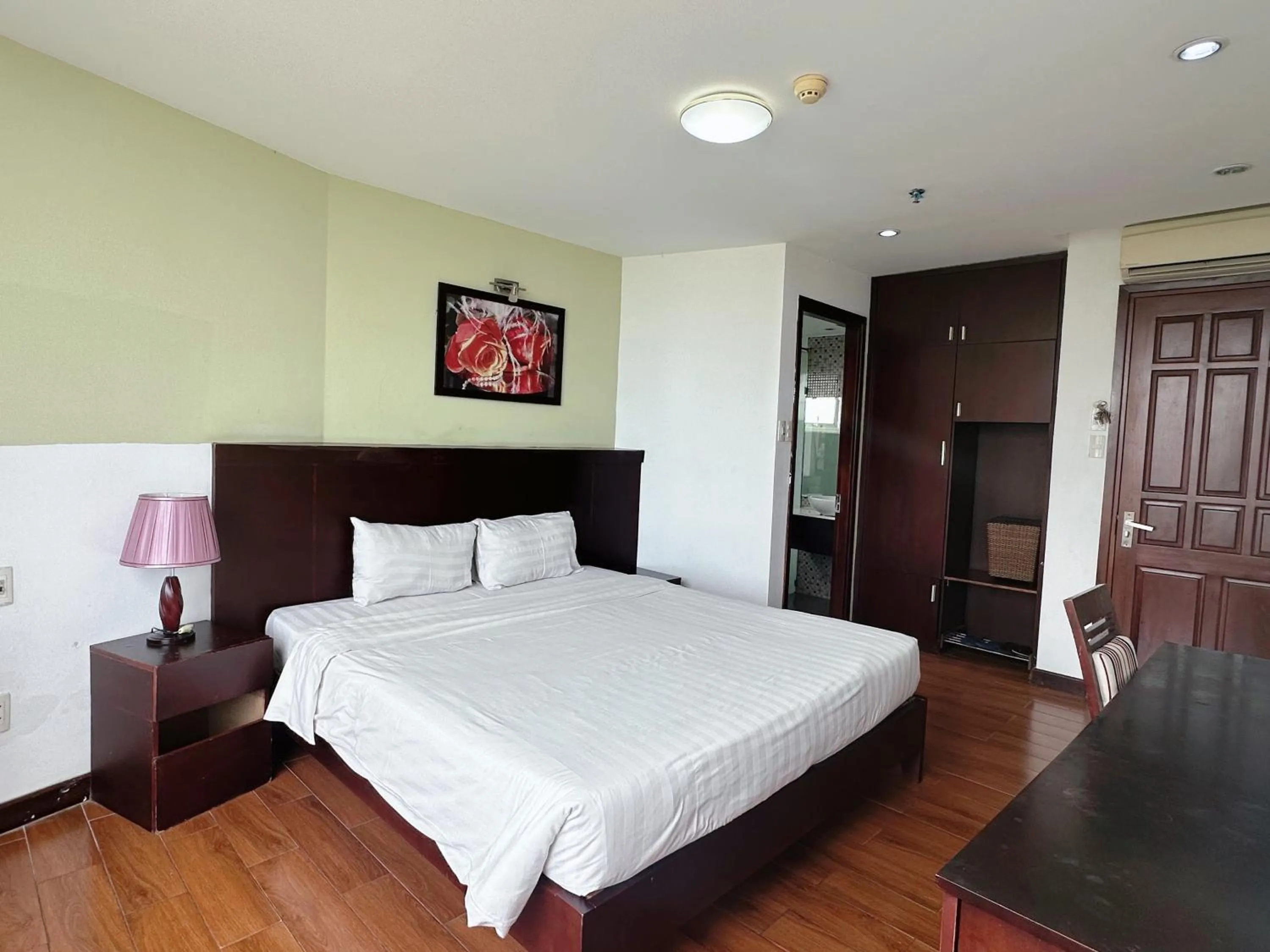 Bed in Dragon Sea Hotel