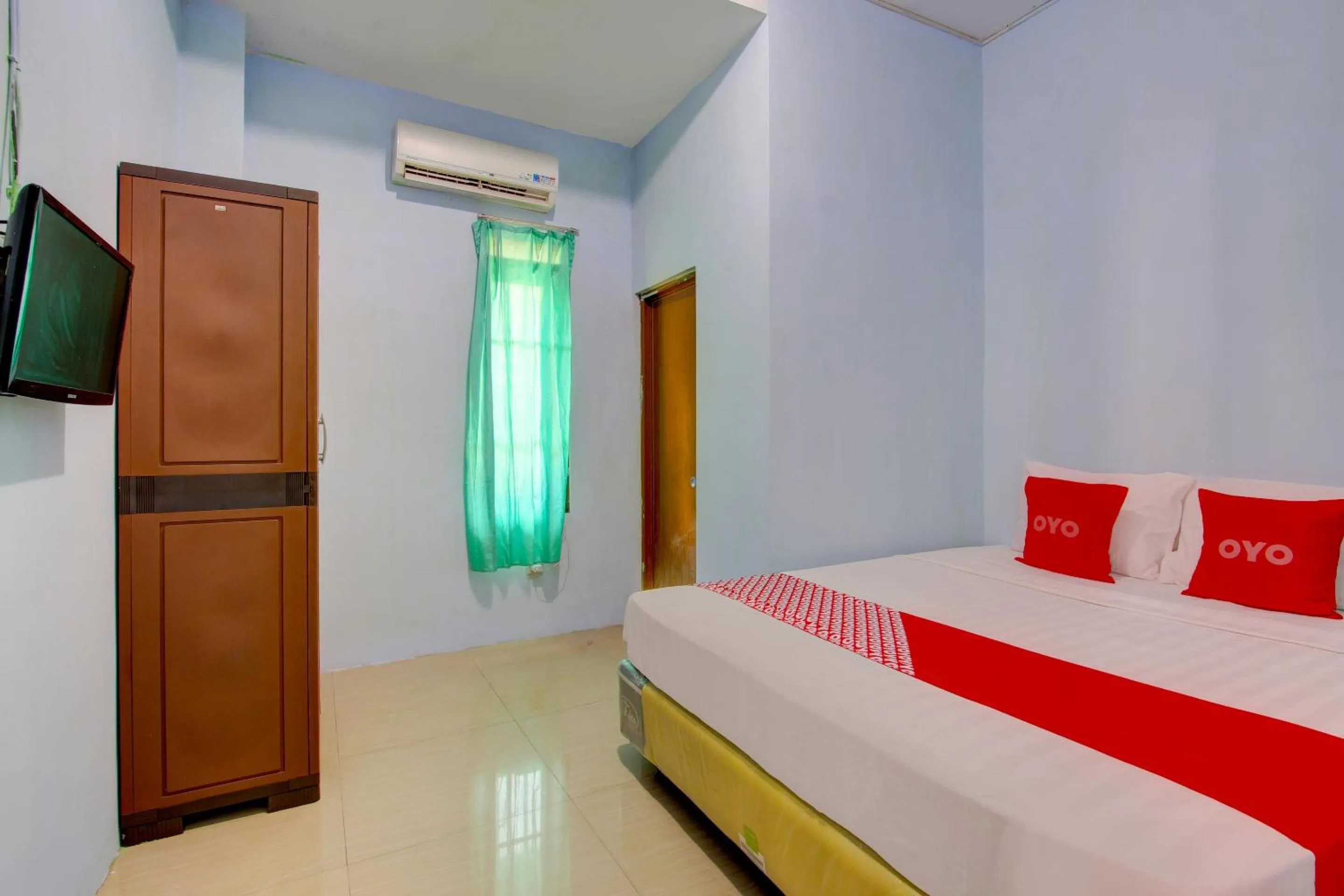 Deluxe Double Room in Griya Kencana Asri Syariah near RS Karima Utama Kartasura RedPartner
