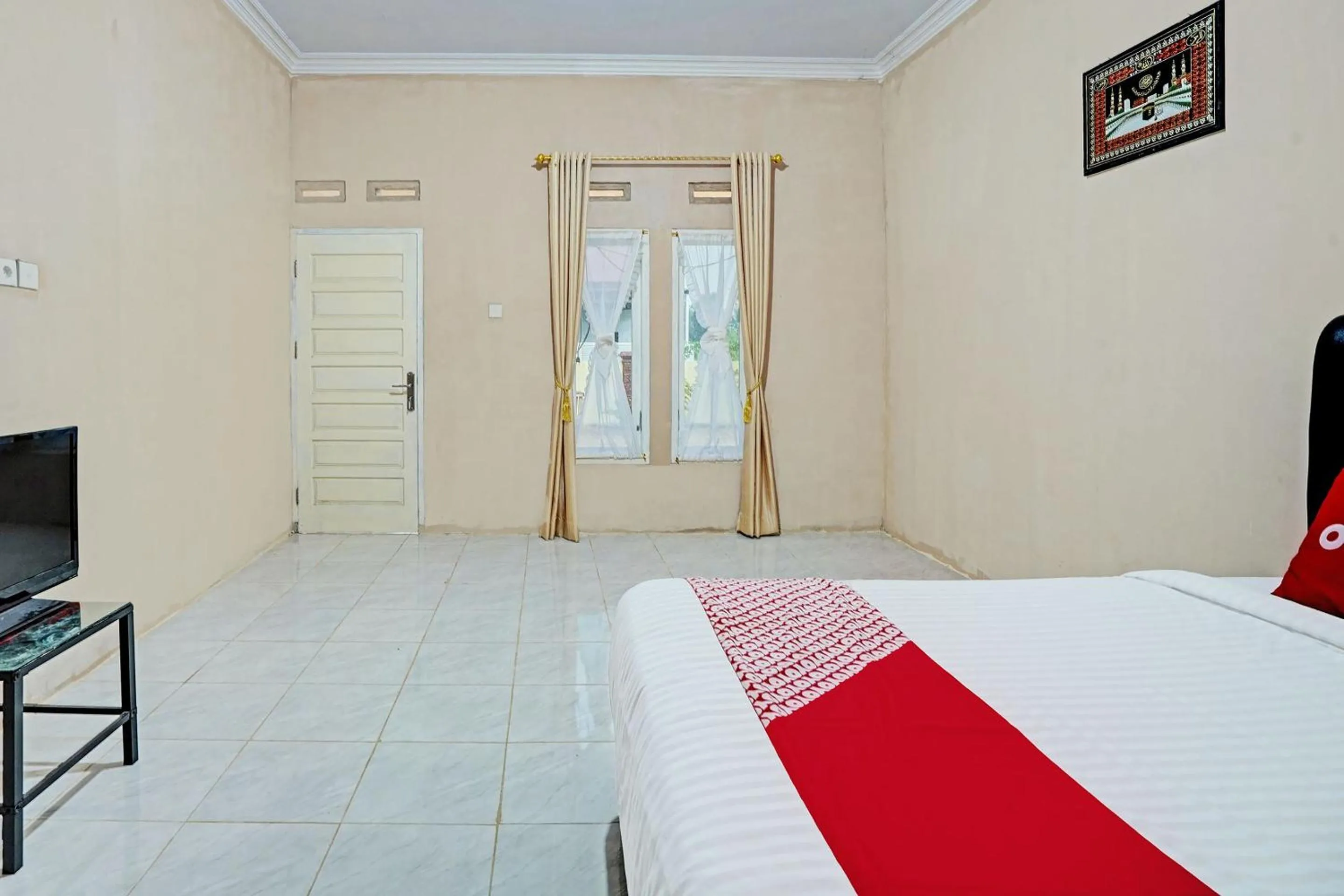 Bedroom in Hotel O Mutiara Homestay Syariah Near TPA / TPSA Nurul Yakin