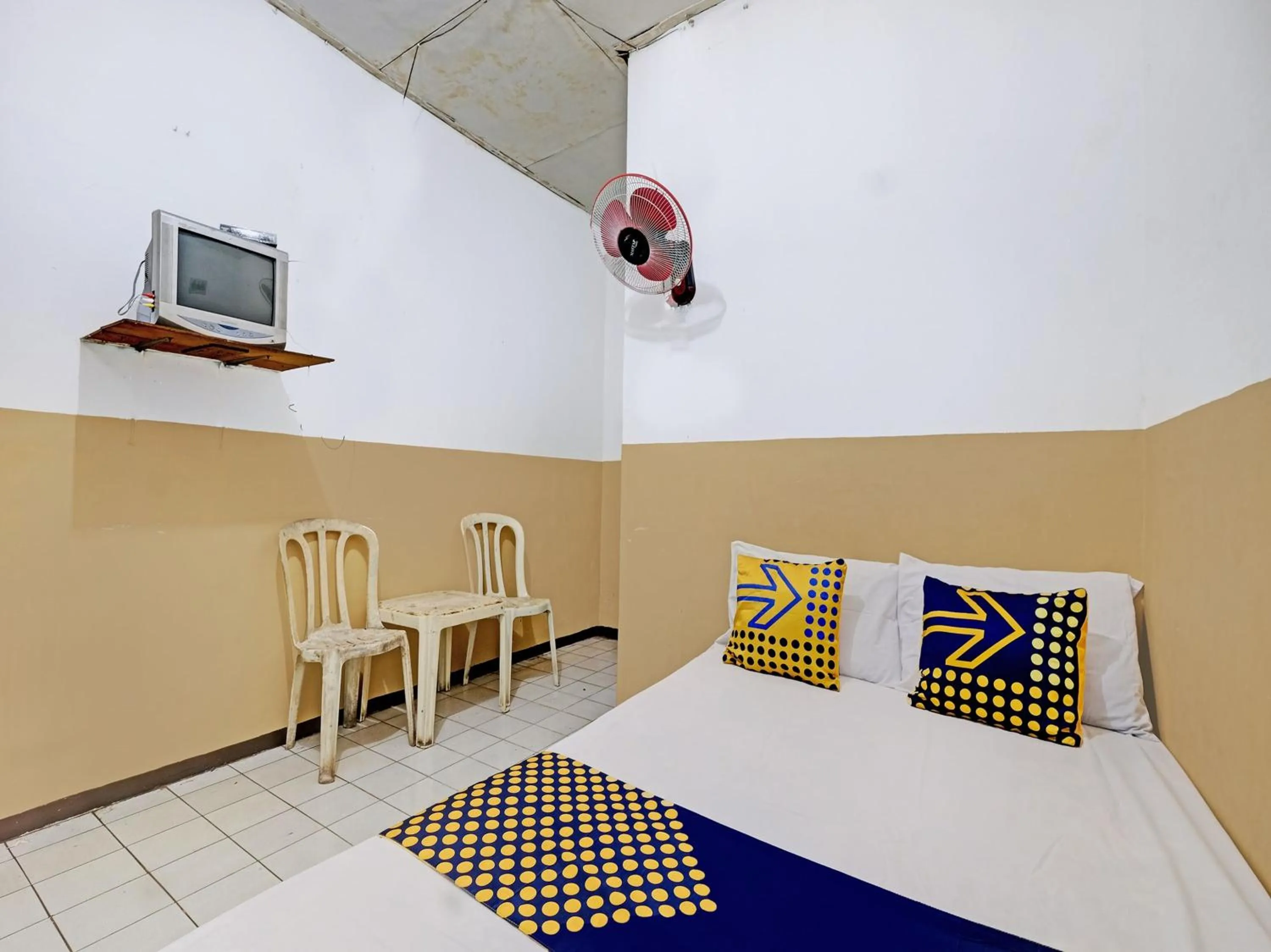 Bedroom in SPOT ON 92983 Hotel Ayu