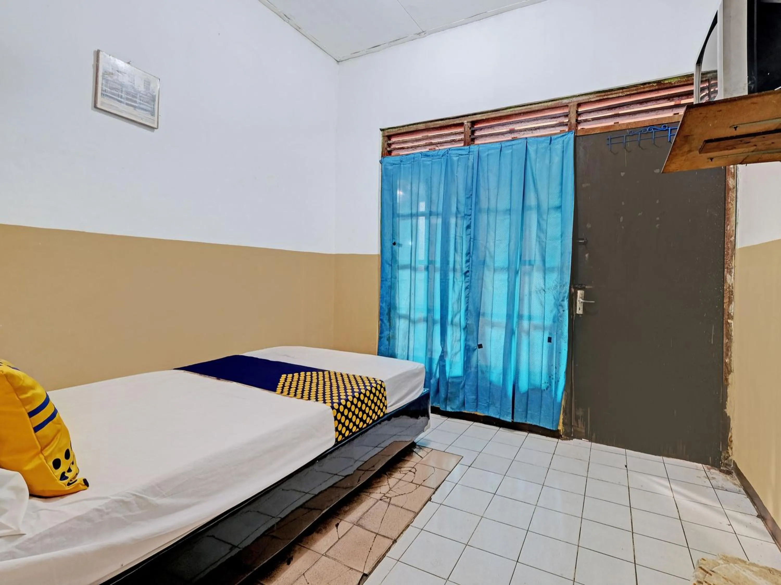 Bedroom in SPOT ON 92983 Hotel Ayu