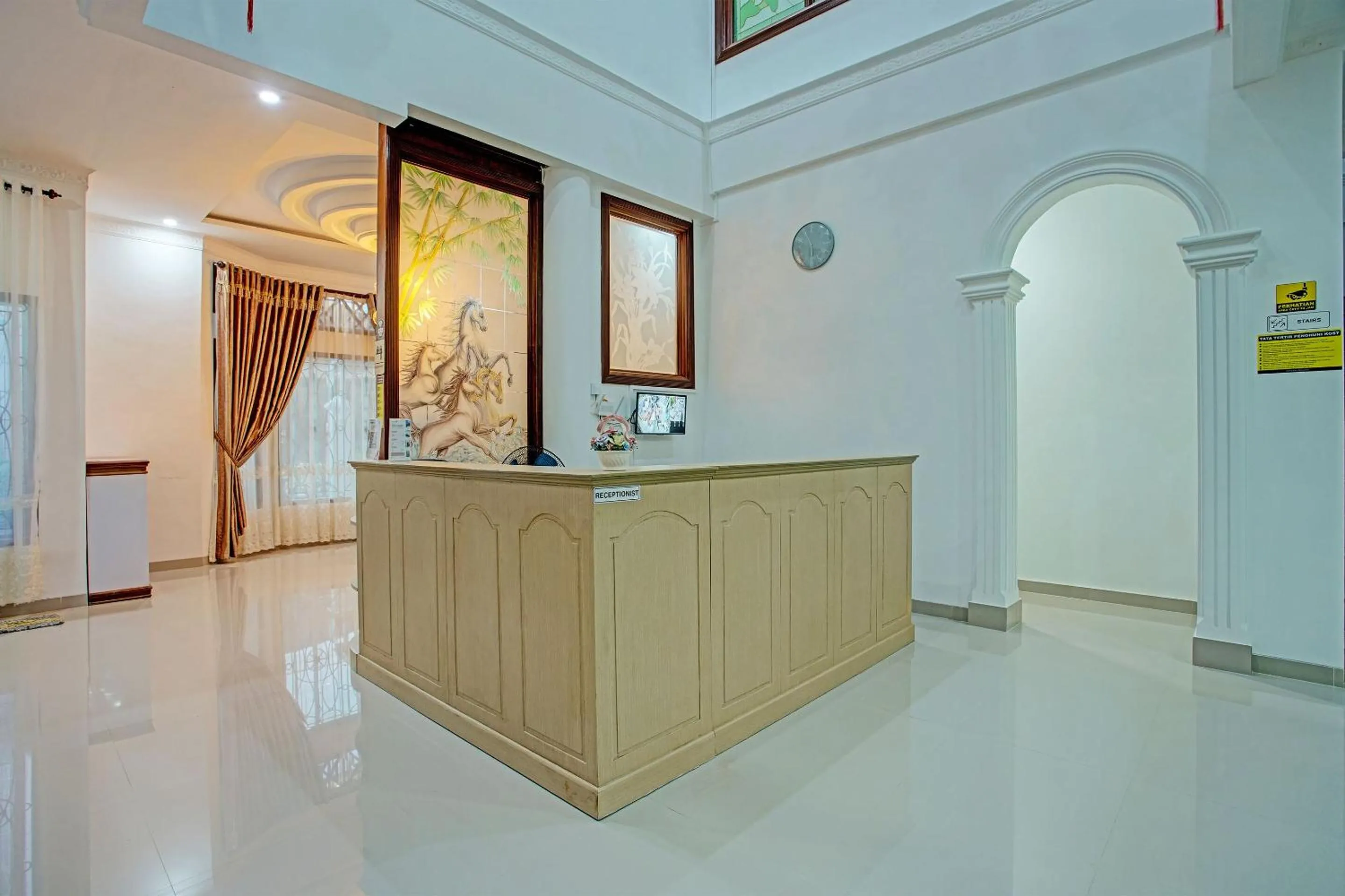Lobby or reception in Capital O 92990 Nena Kostel Syariah
