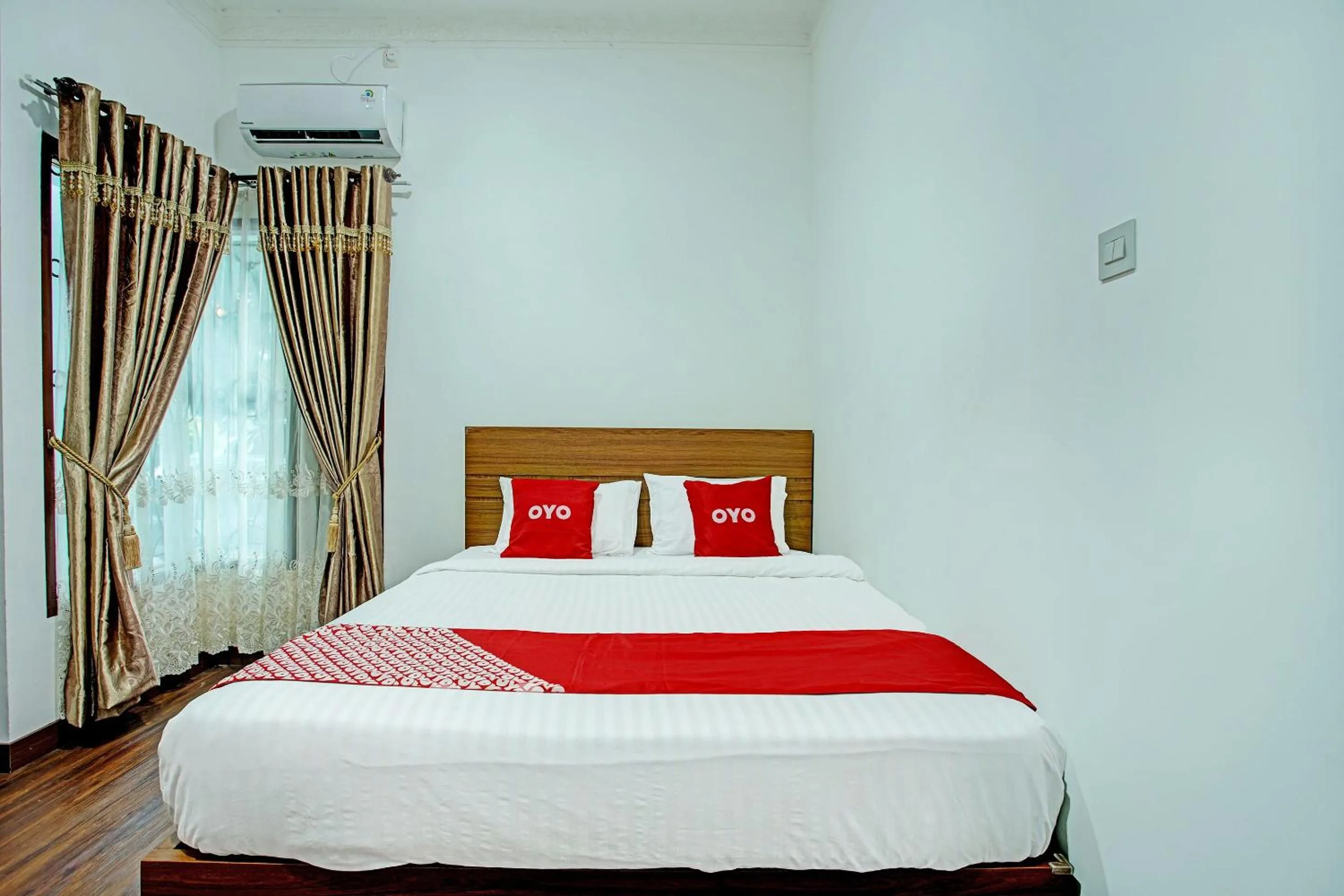 Bedroom in Capital O 92990 Nena Kostel Syariah