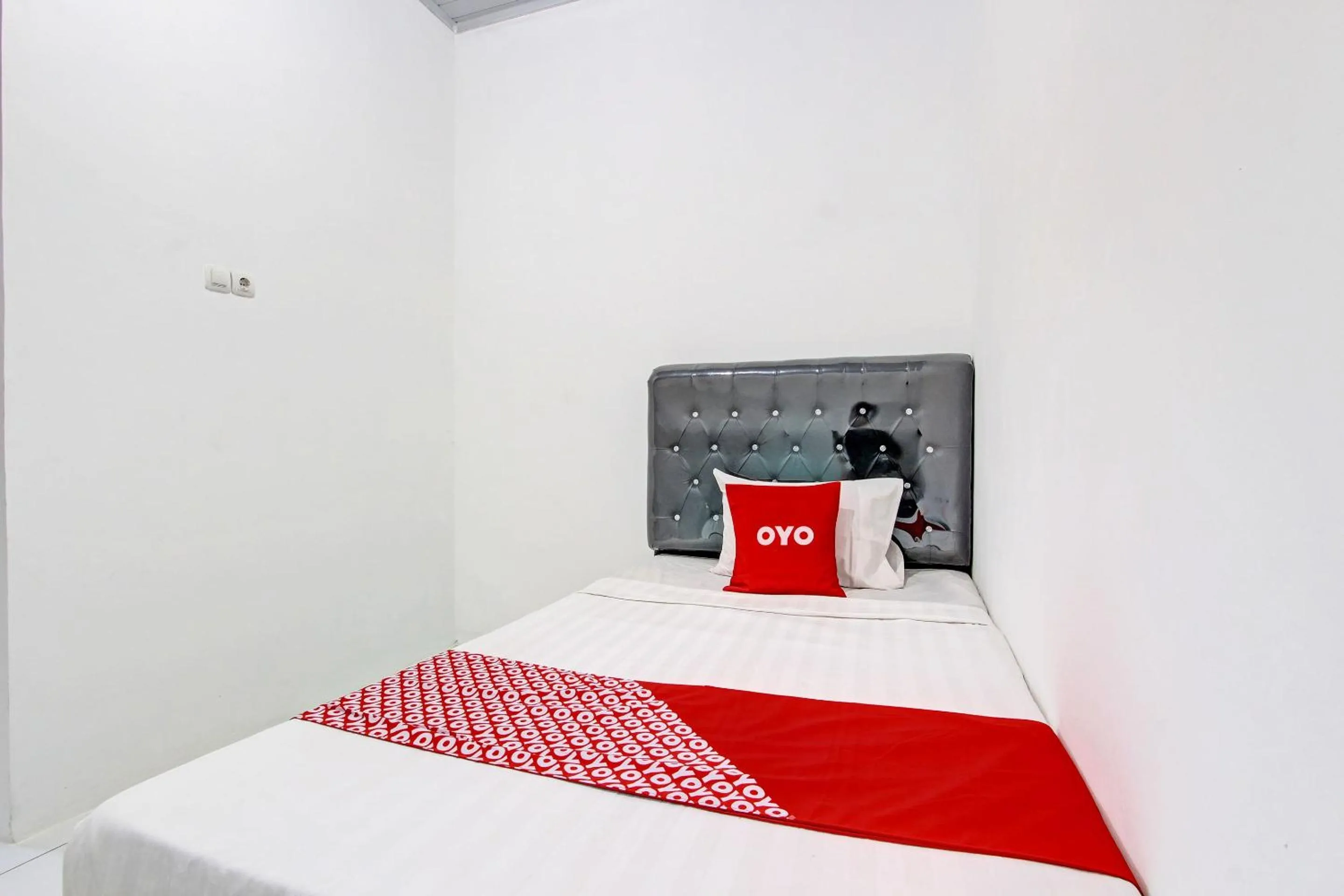 Bedroom, Bed in Hotel O Mi Casa Inn