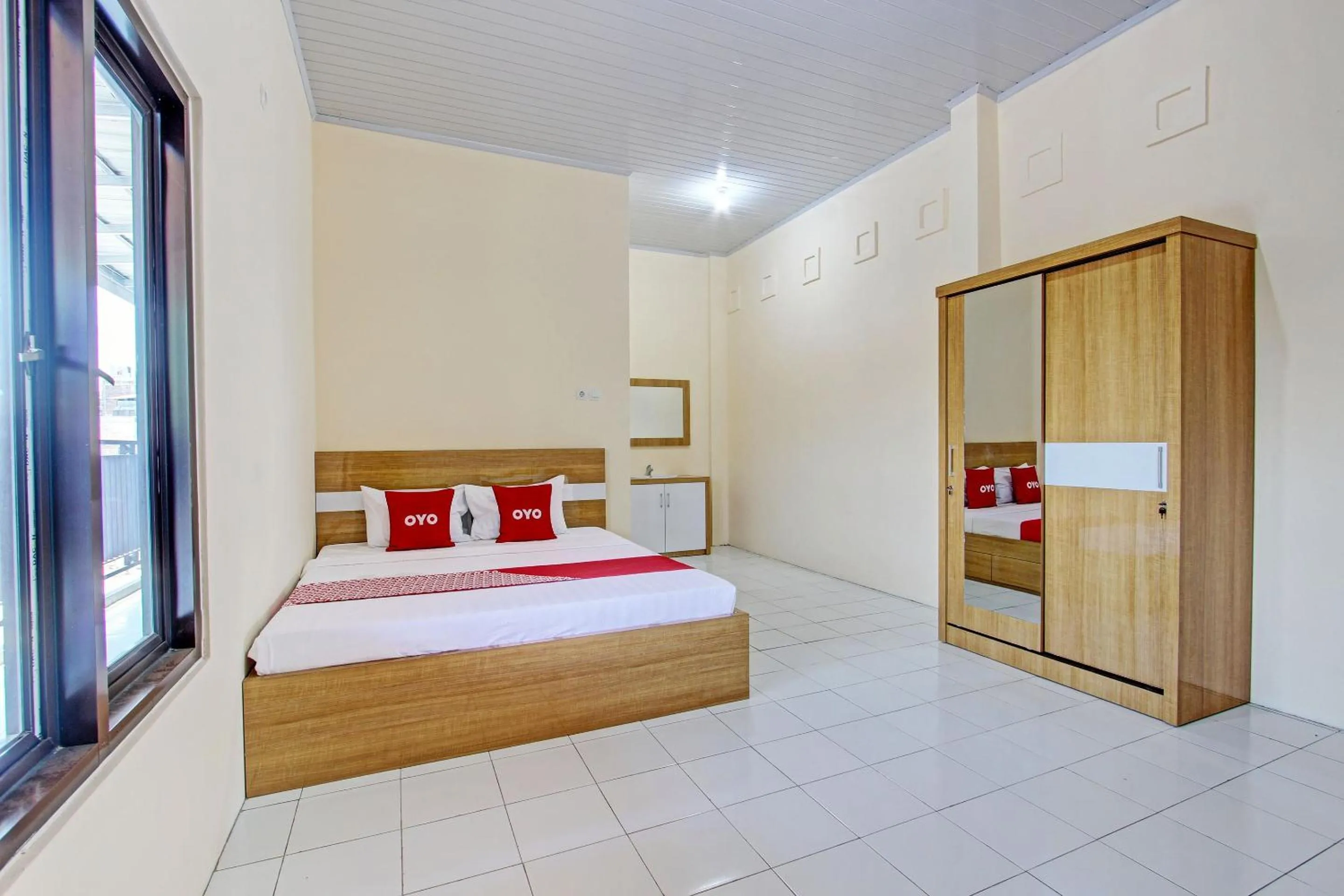 Bedroom, Bed in Hotel O Mi Casa Inn