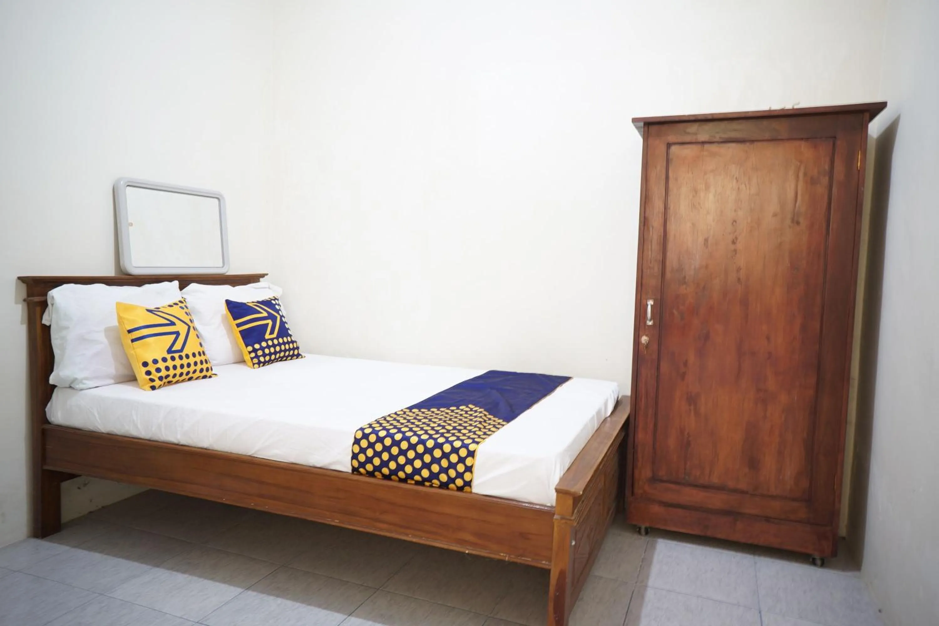 Photo of the whole room, Bed in Hotel O Kost Amantu