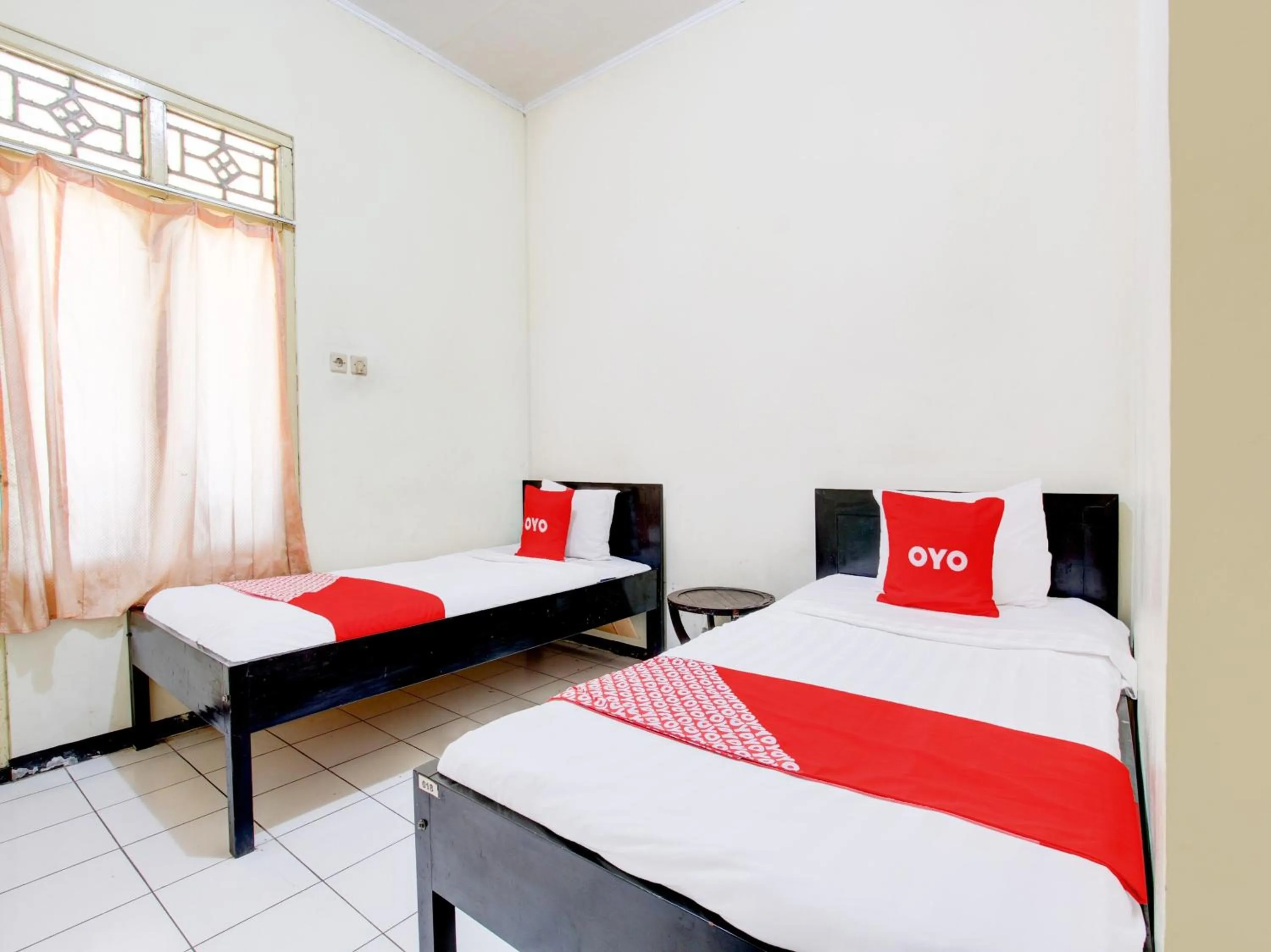 Bedroom in OYO 93048 Hotel Puri Mandiri