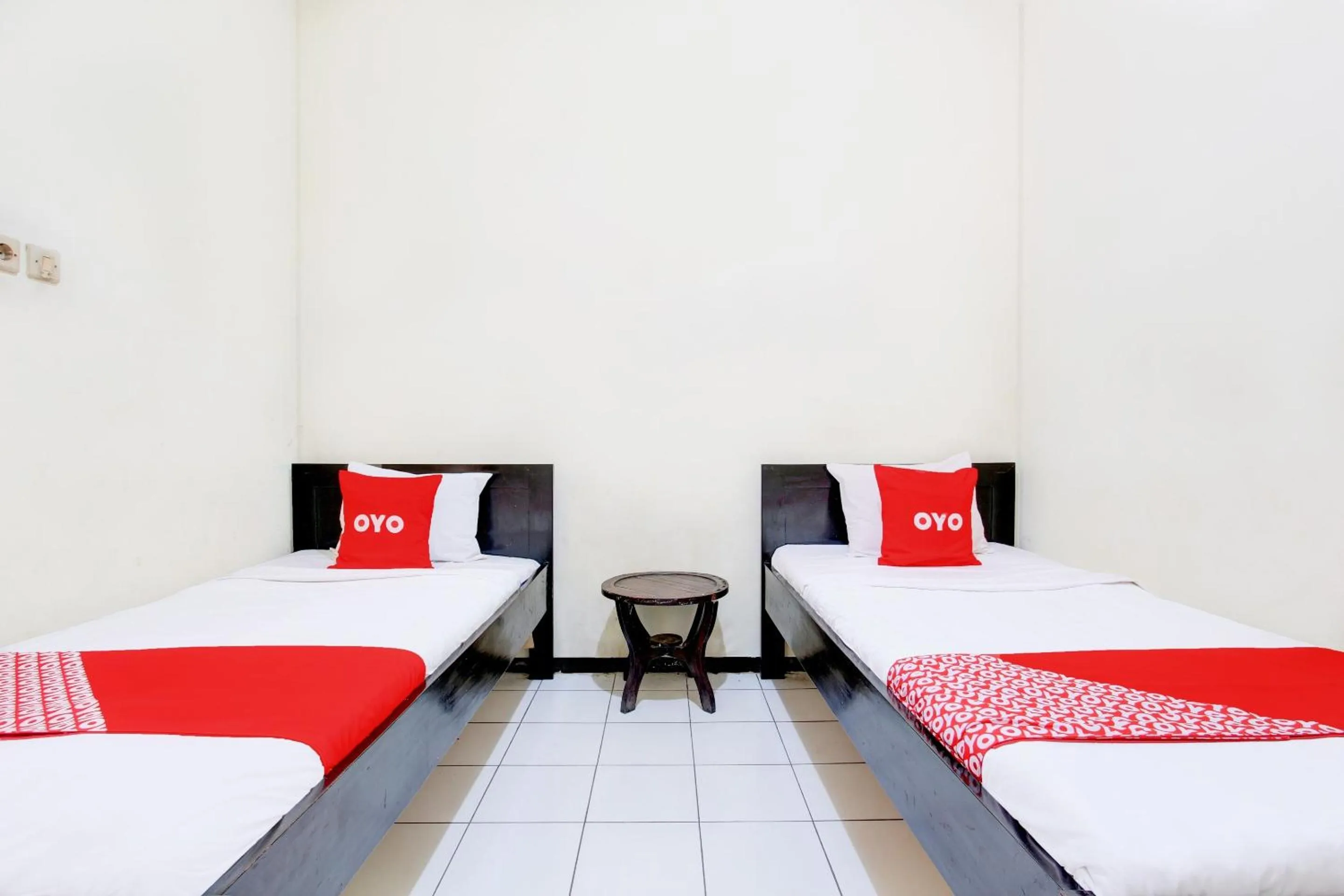 Bedroom in OYO 93048 Hotel Puri Mandiri