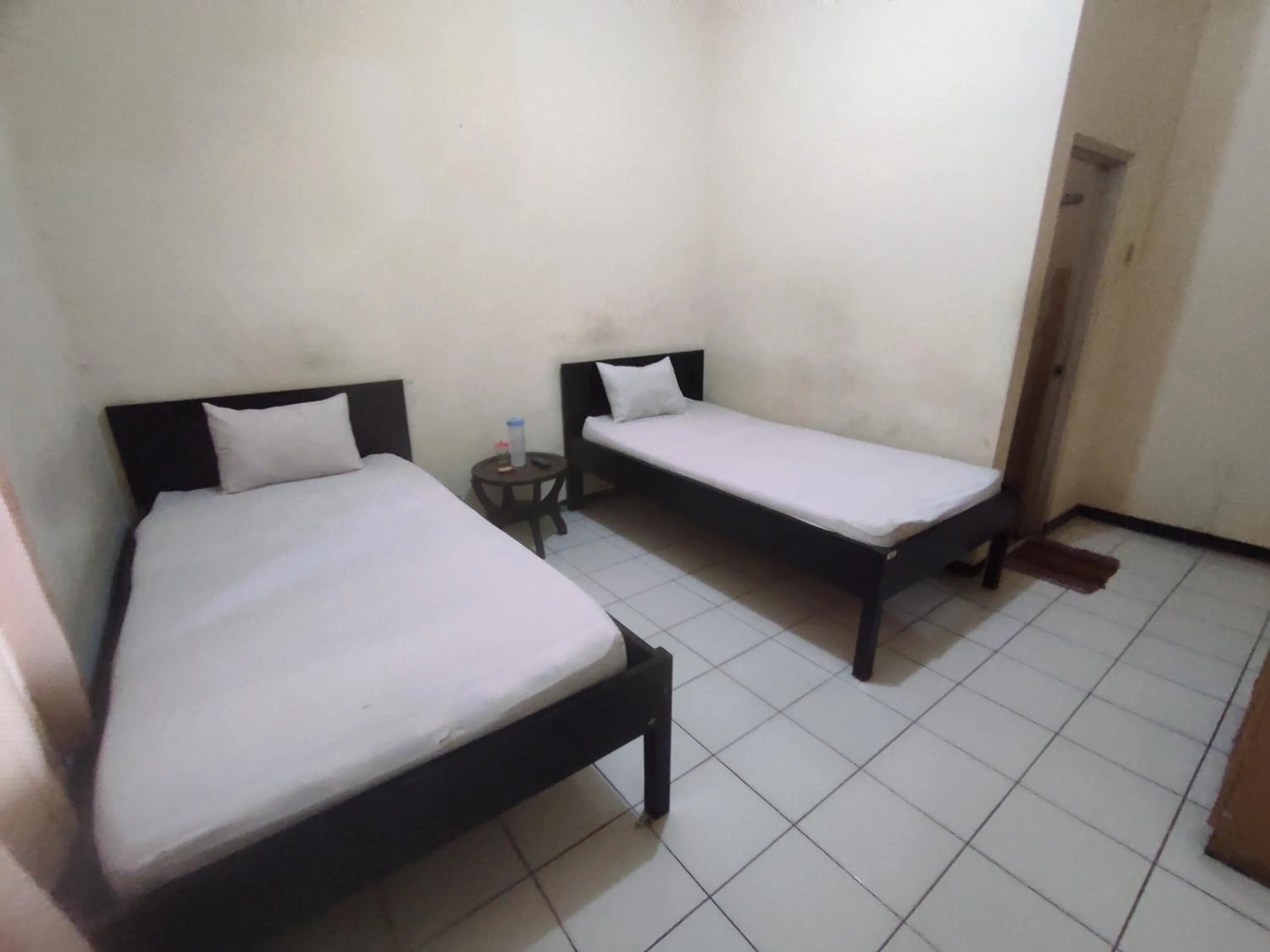 Budget Twin Room in OYO 93048 Hotel Puri Mandiri