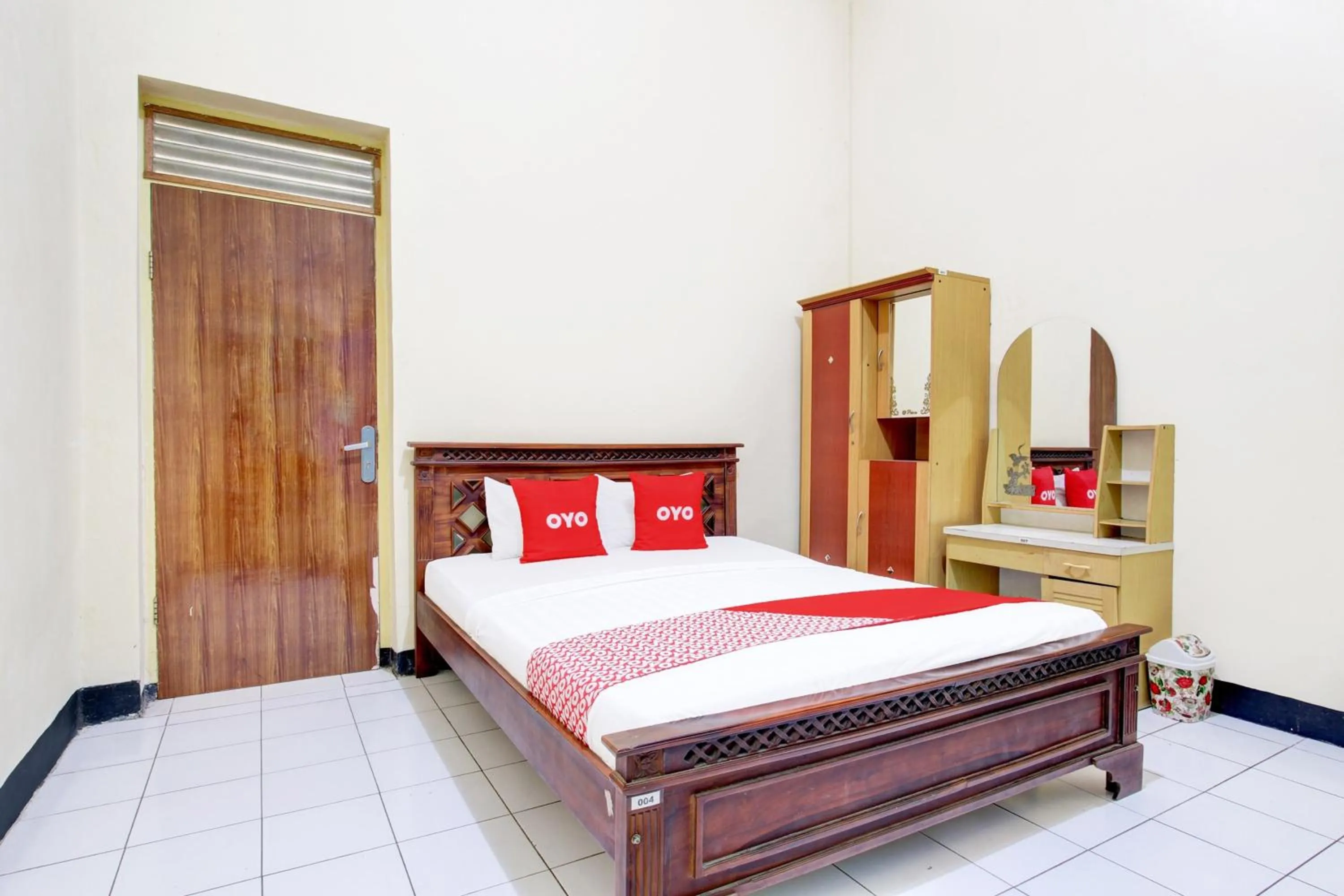 Bedroom in OYO 93048 Hotel Puri Mandiri