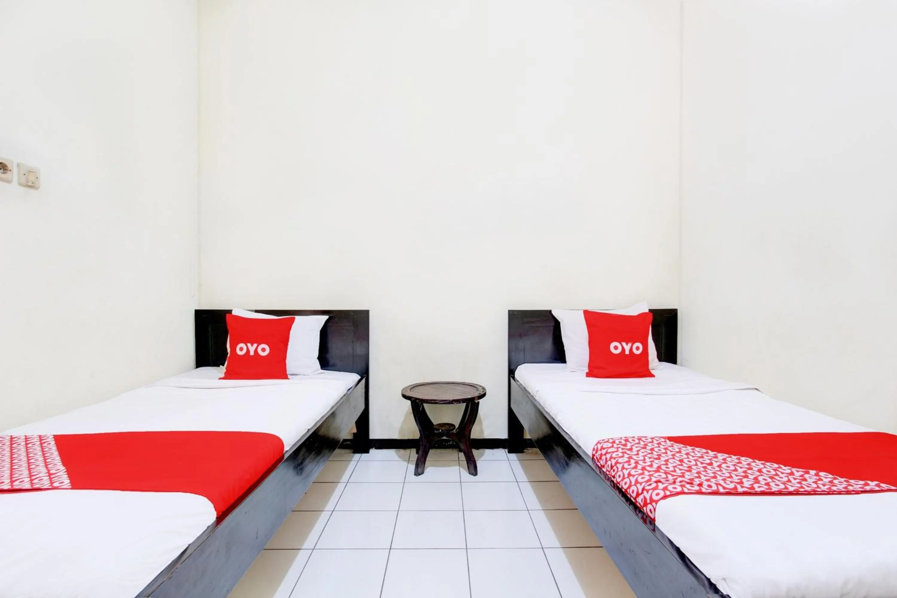 Bedroom in OYO 93048 Hotel Puri Mandiri