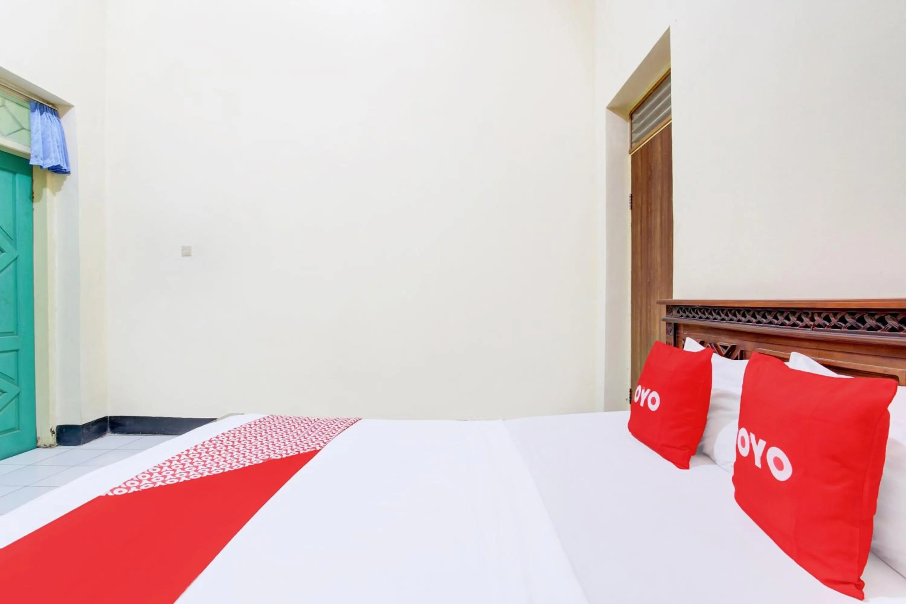 Bedroom in OYO 93048 Hotel Puri Mandiri