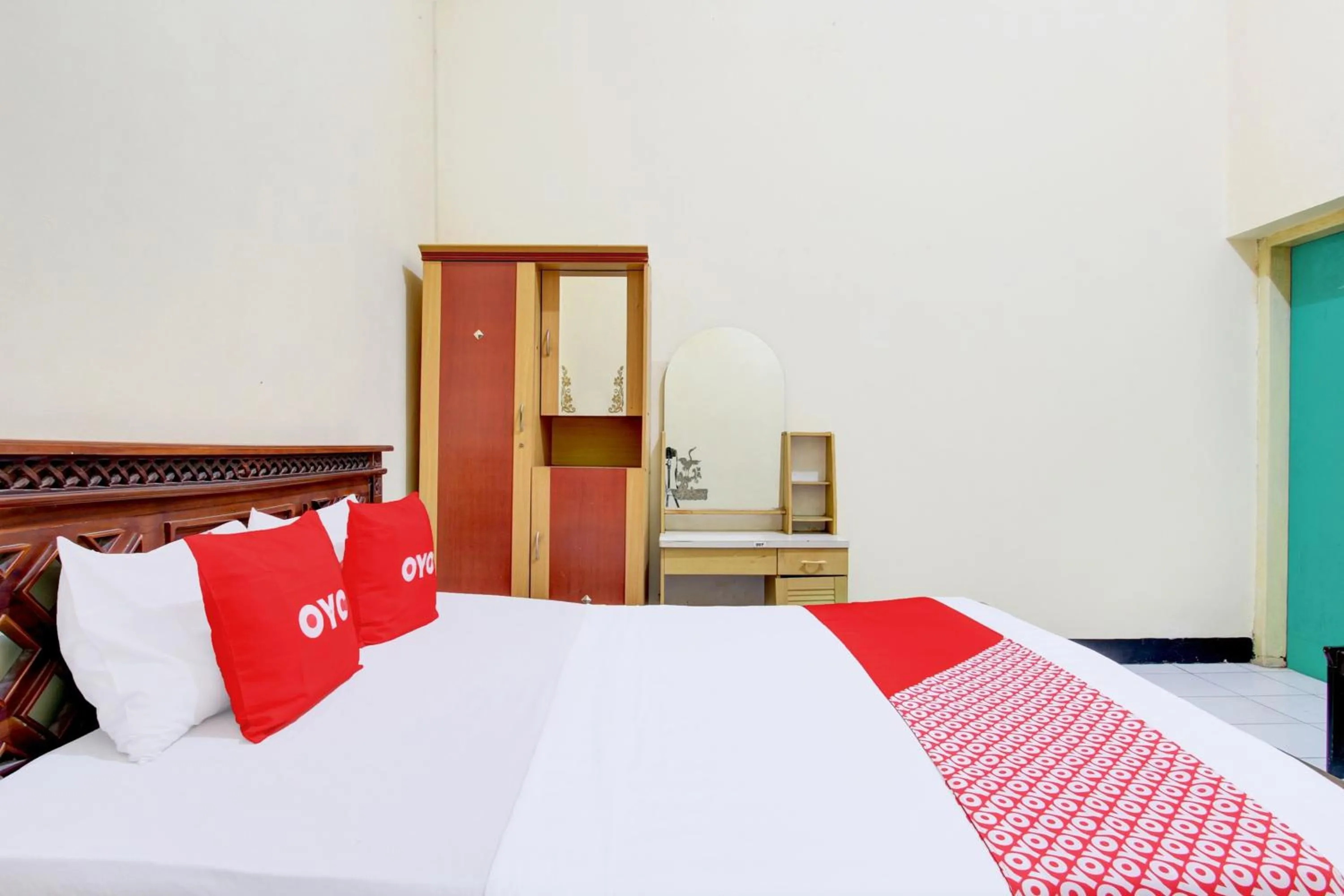 Bedroom in OYO 93048 Hotel Puri Mandiri