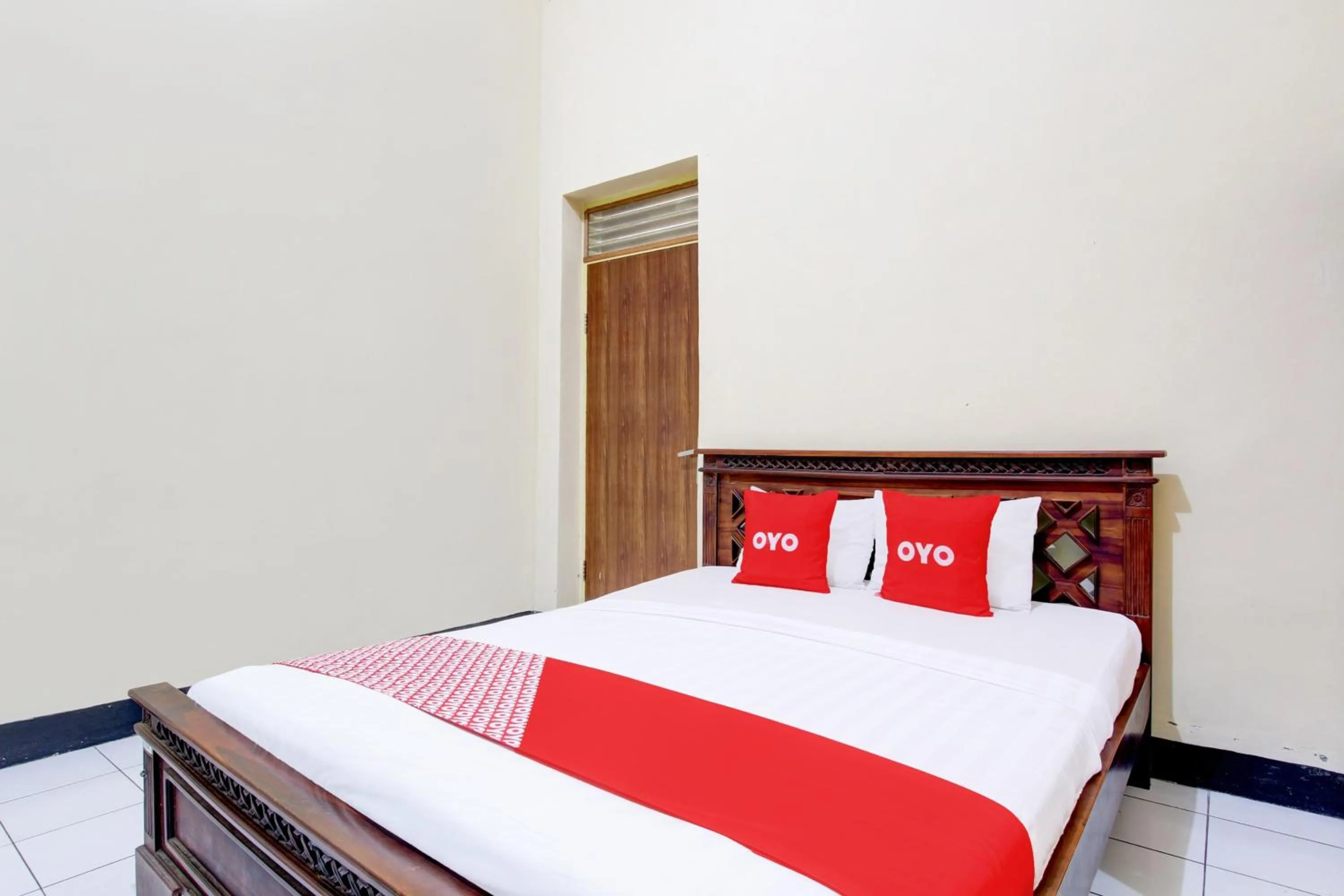 Bedroom in OYO 93048 Hotel Puri Mandiri