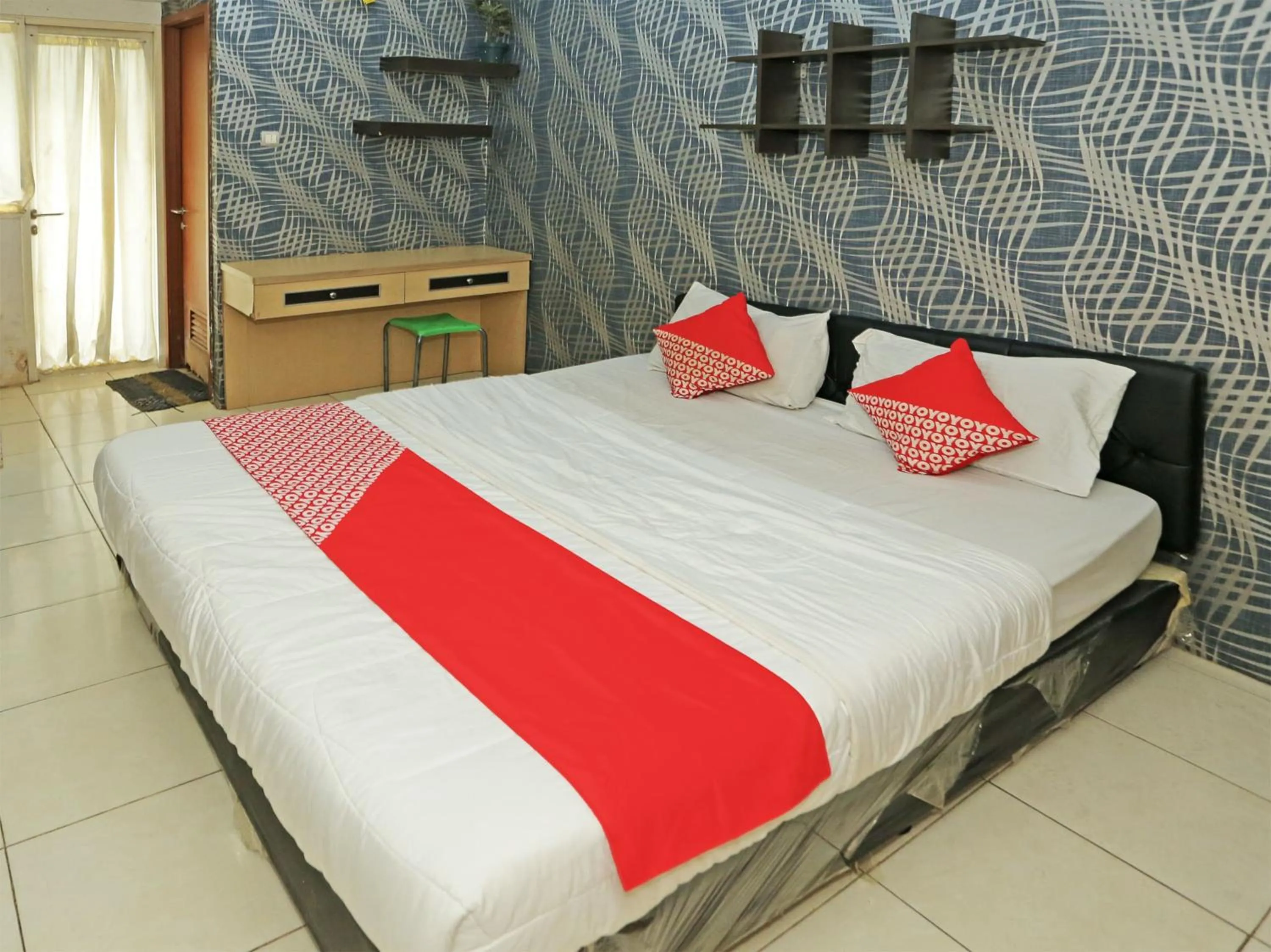 Bedroom in Capital O 92971 Pelangi Residence