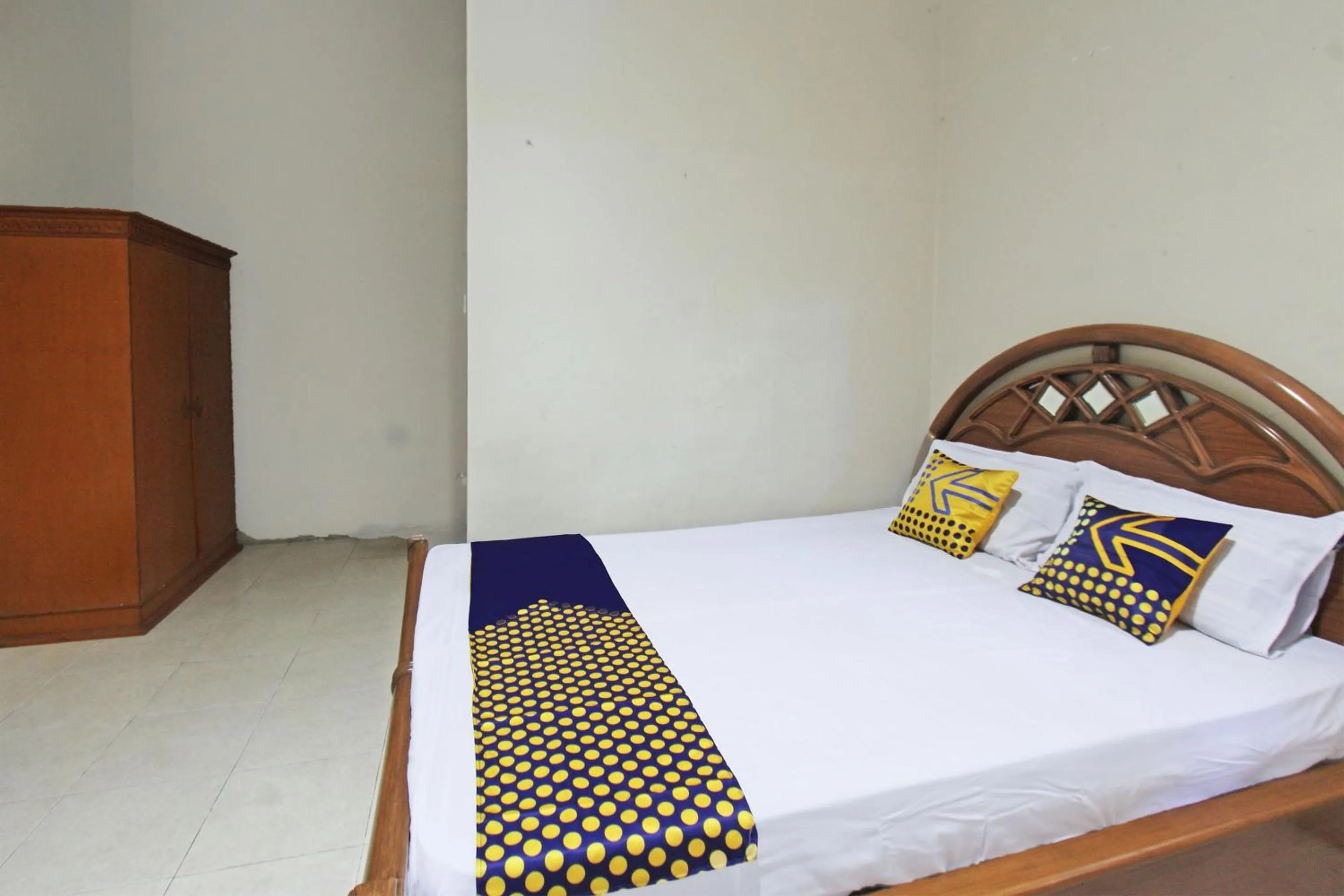 Bedroom in SPOT ON 92973 Madani Syariah Guesthouse