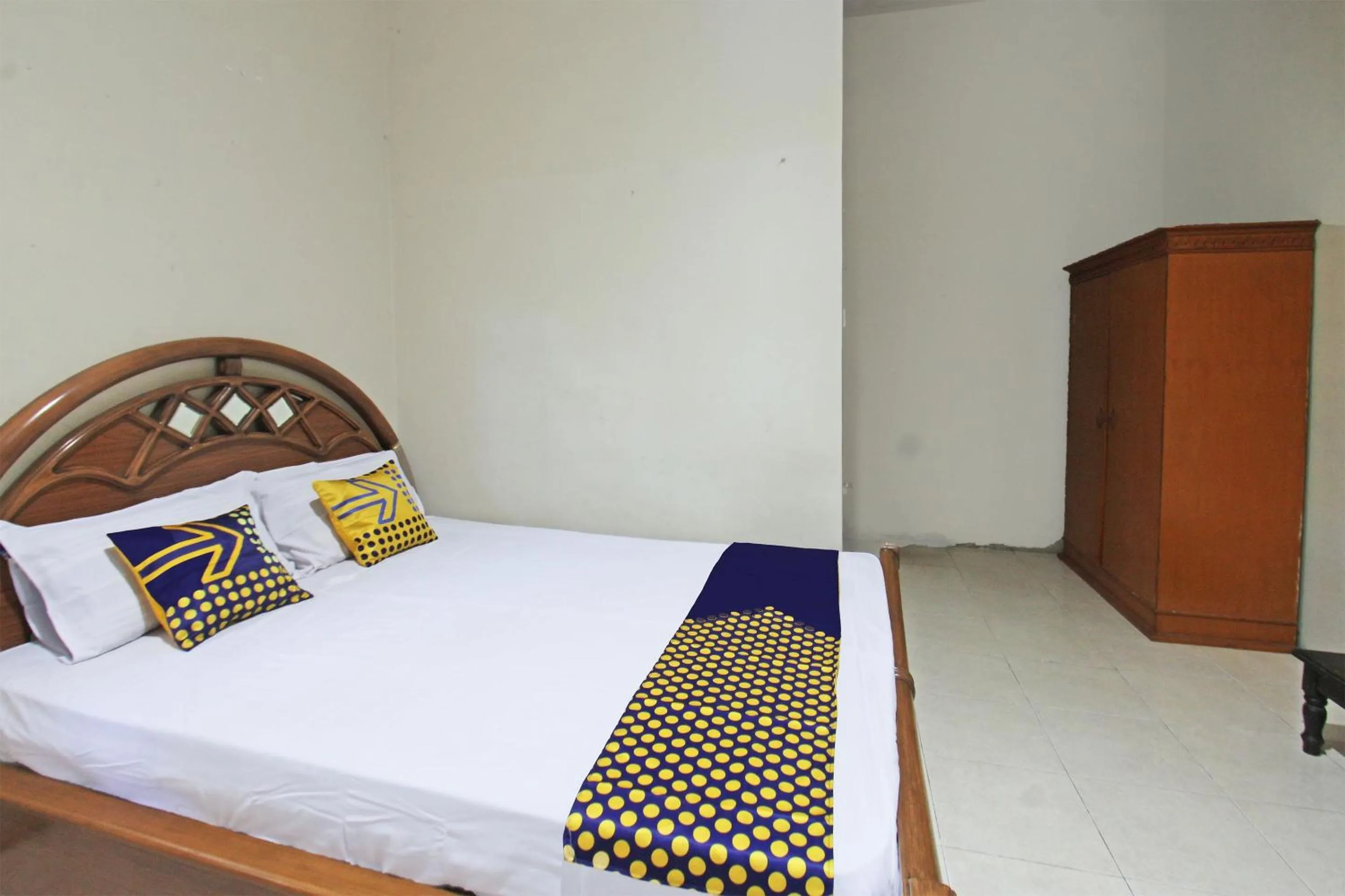 Bedroom in SPOT ON 92973 Madani Syariah Guesthouse