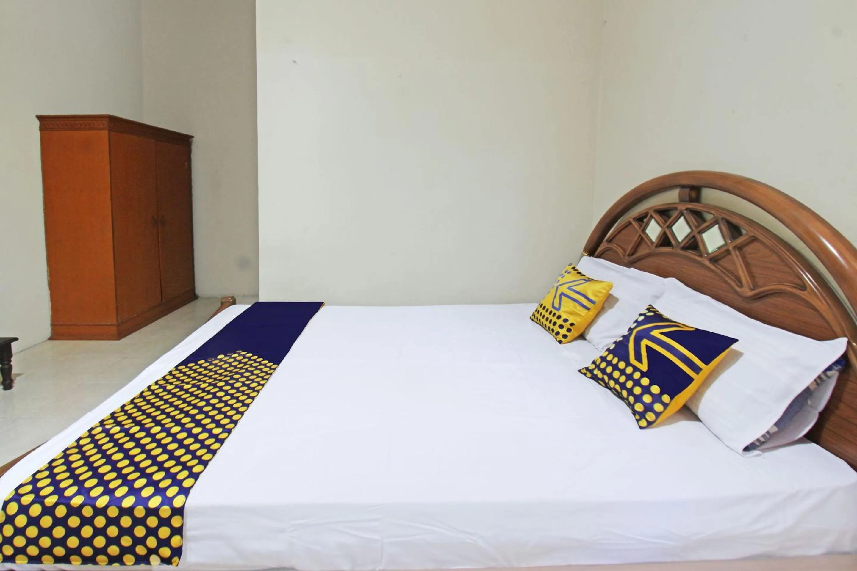 Bedroom in SPOT ON 92973 Madani Syariah Guesthouse