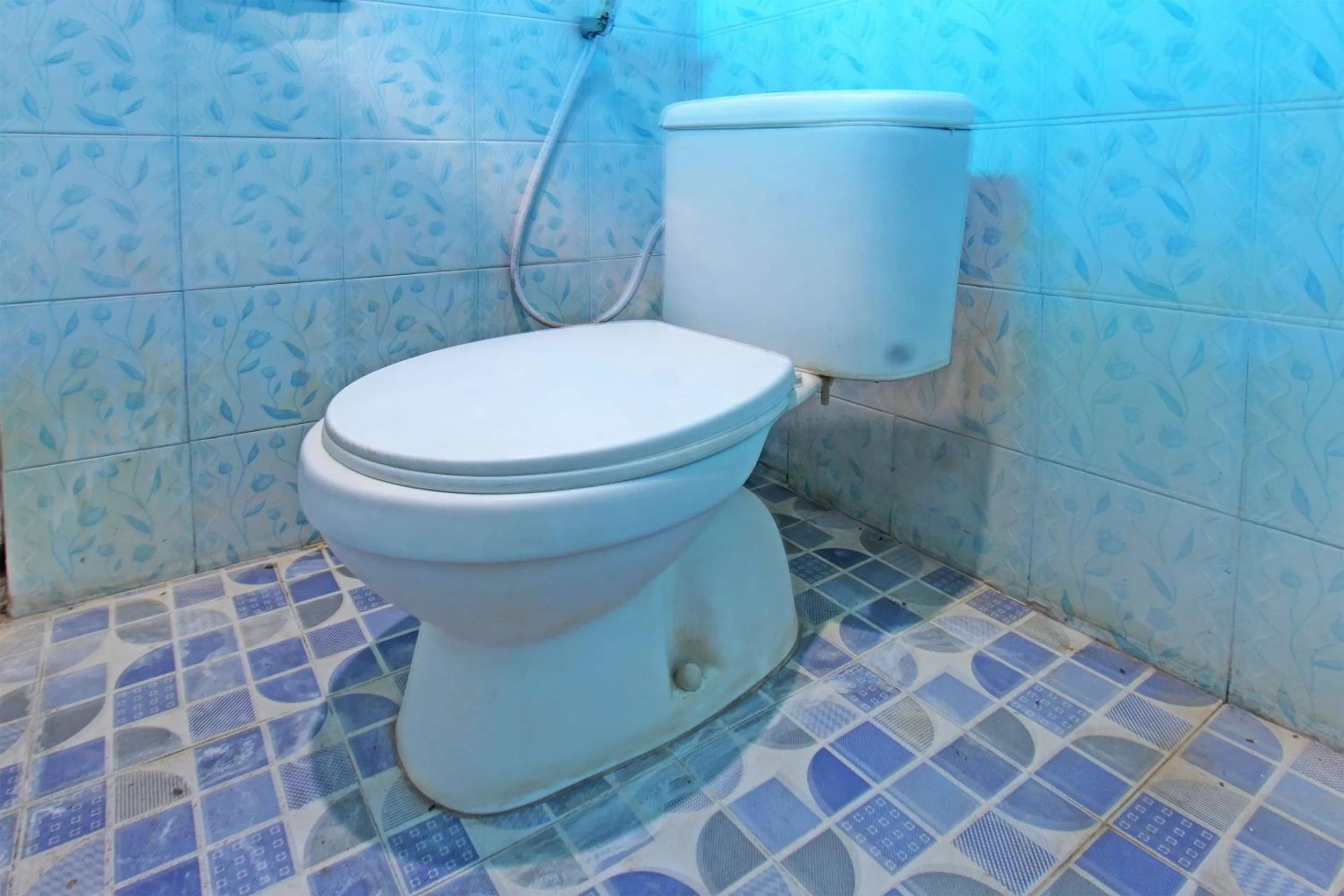 Bathroom in SPOT ON 92973 Madani Syariah Guesthouse