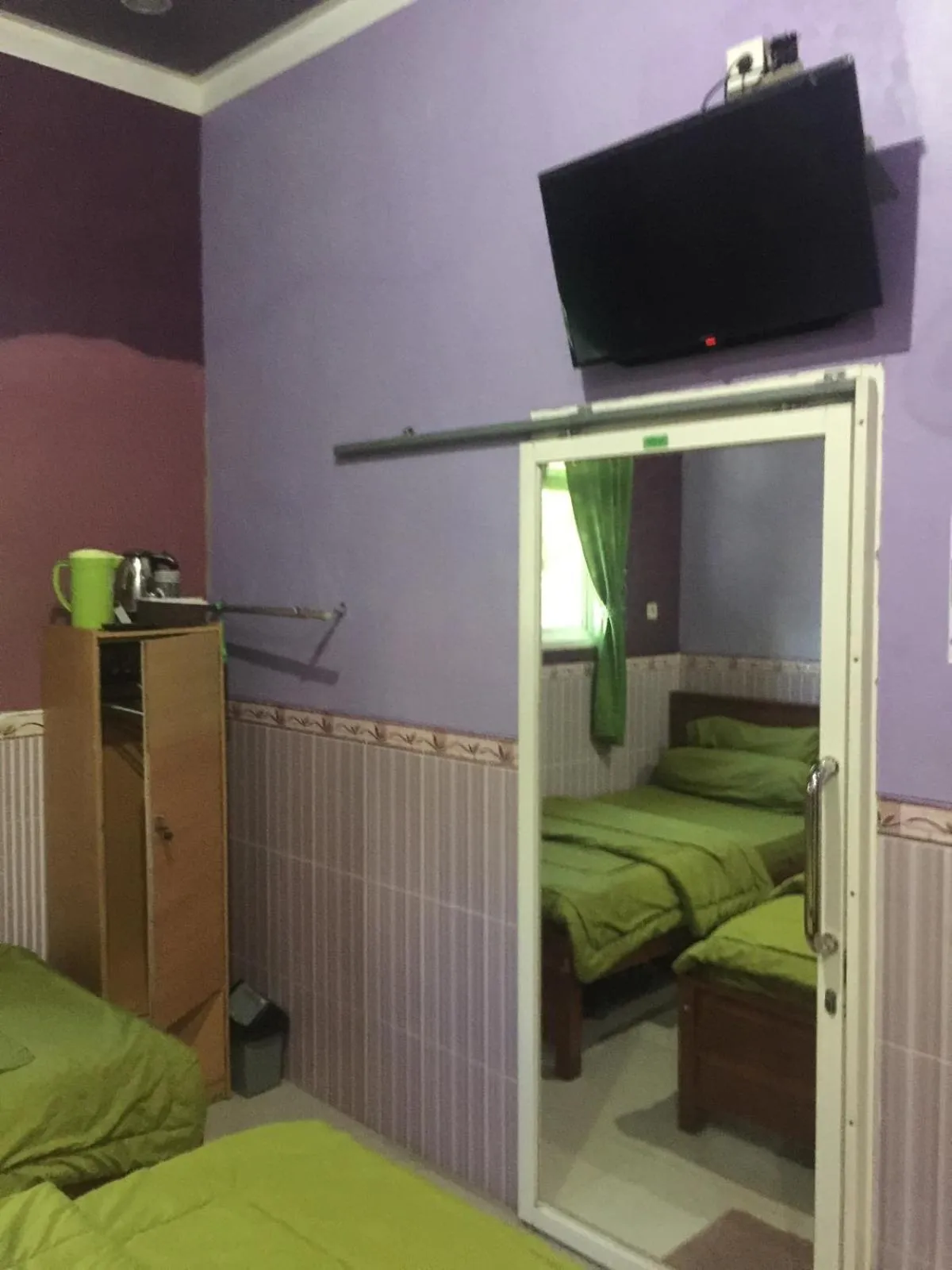 Bedroom, Bed in OYO Life 93055 Fathin Hotel