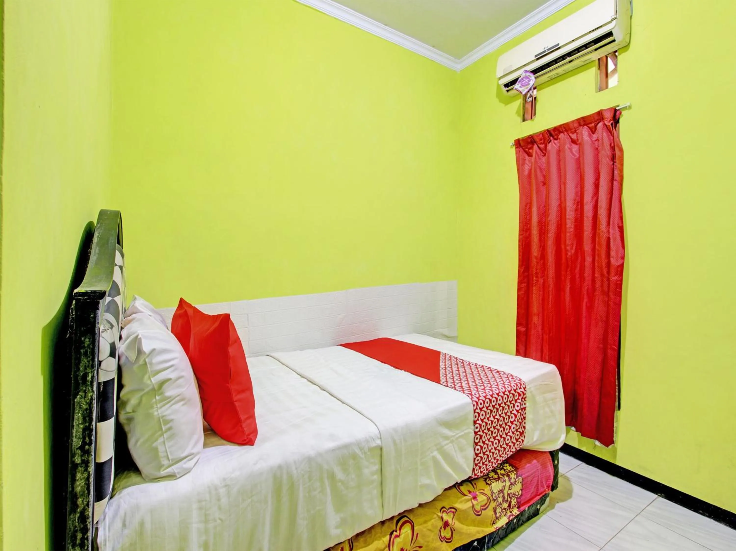Bedroom in OYO 92998 Wiludjeng Guesthouse
