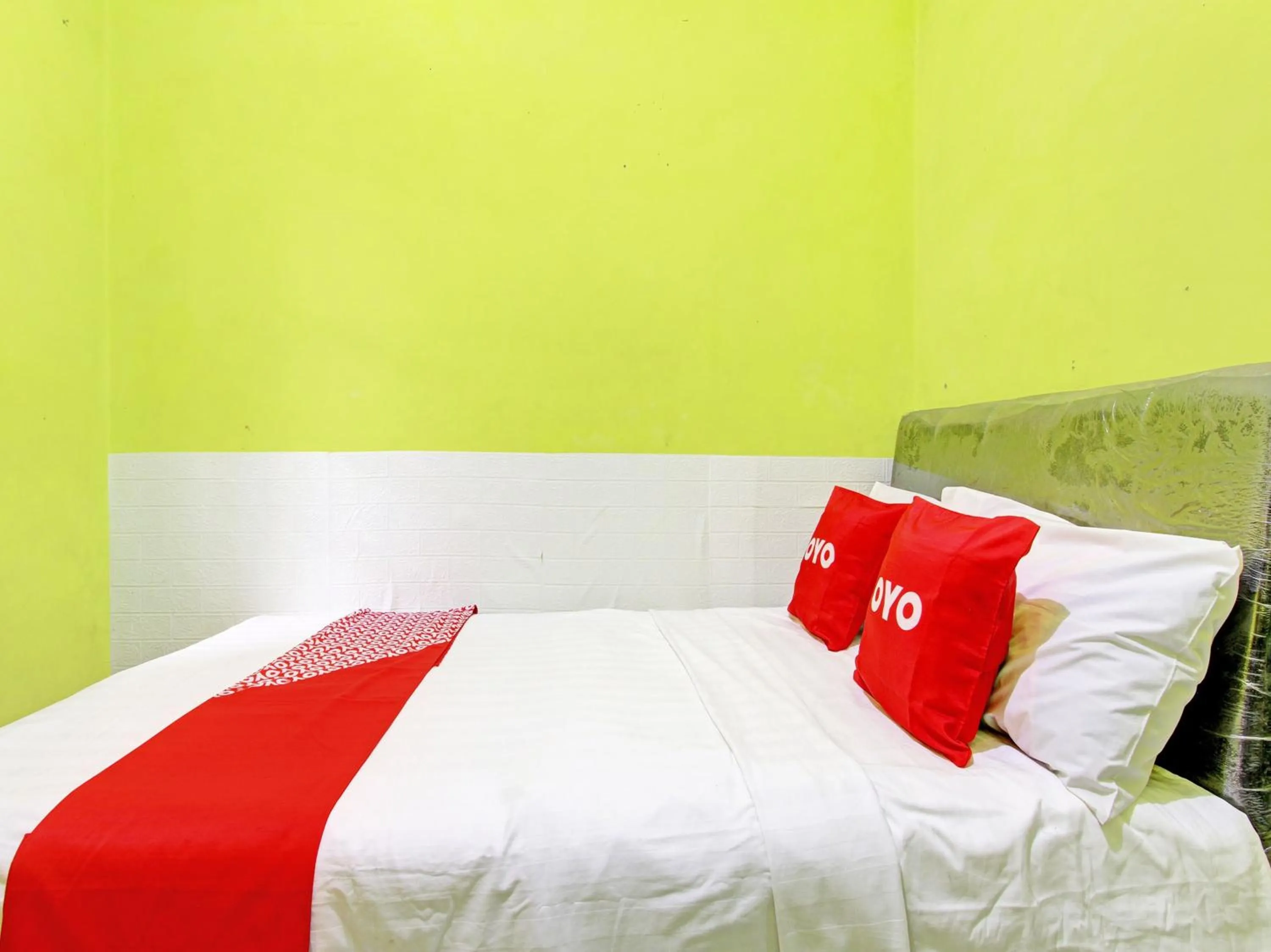 Bedroom in OYO 92998 Wiludjeng Guesthouse