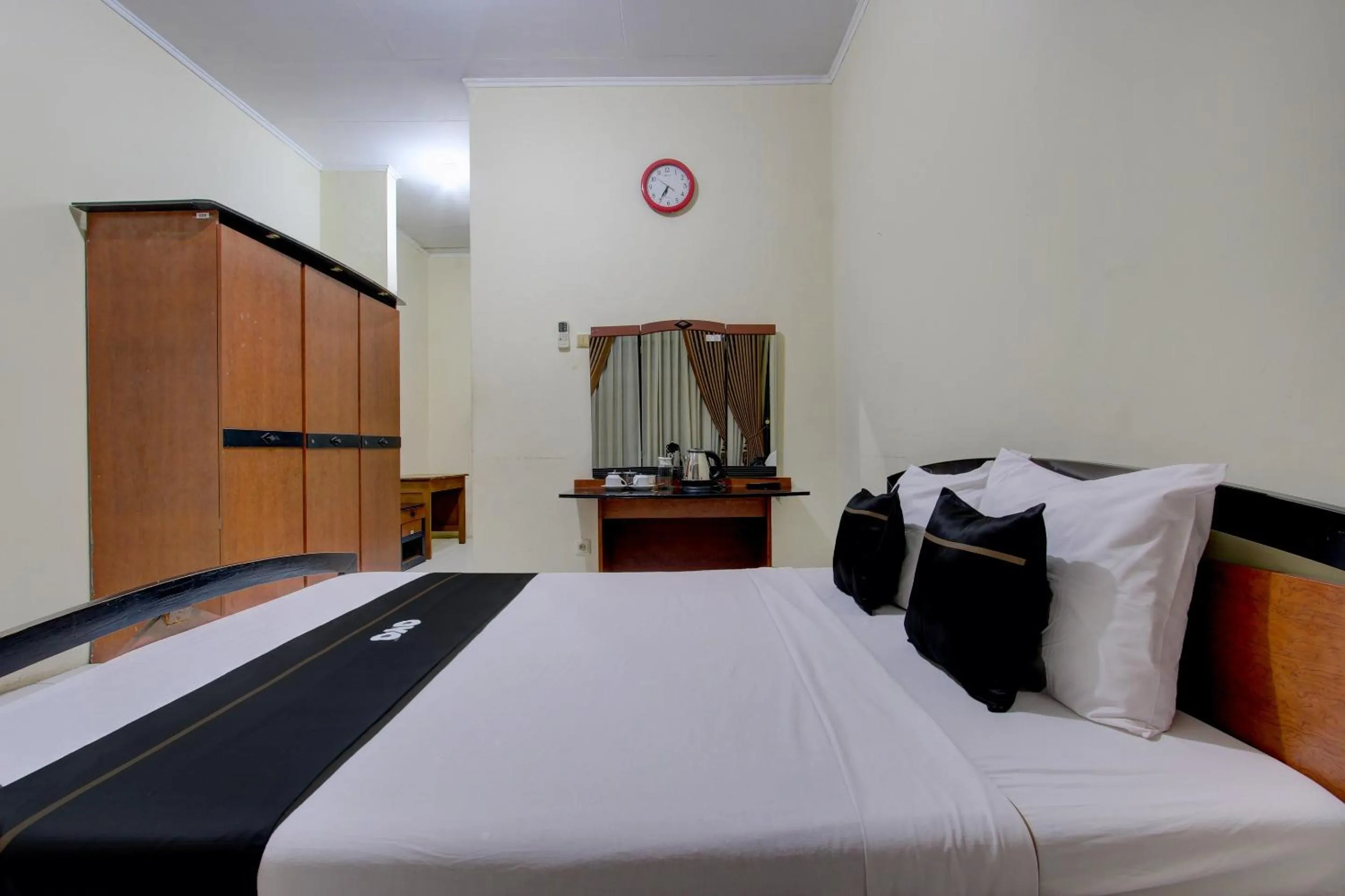 Bedroom in Capital O 93024 Hotel Ganesha