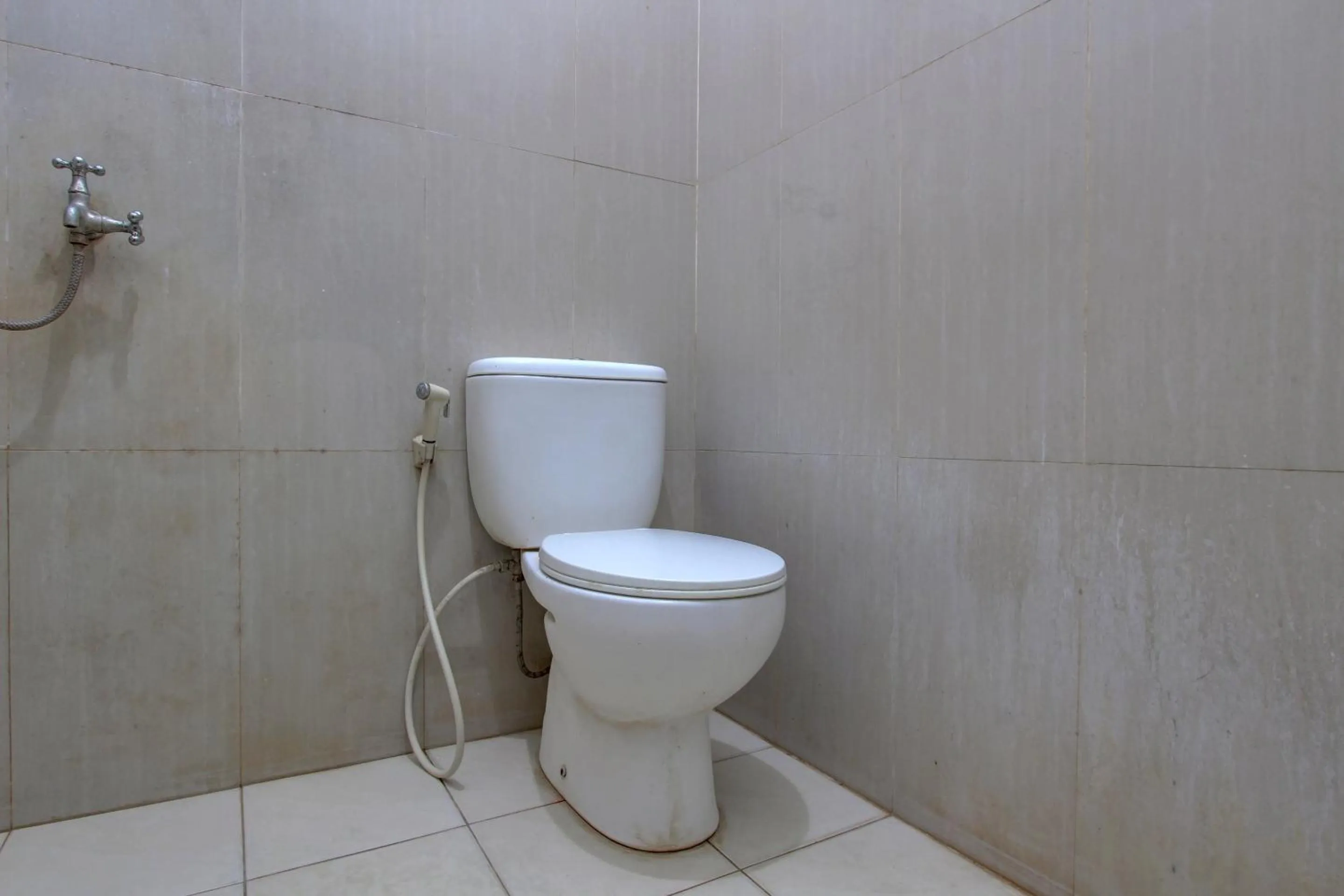 Bathroom in Capital O 93024 Hotel Ganesha