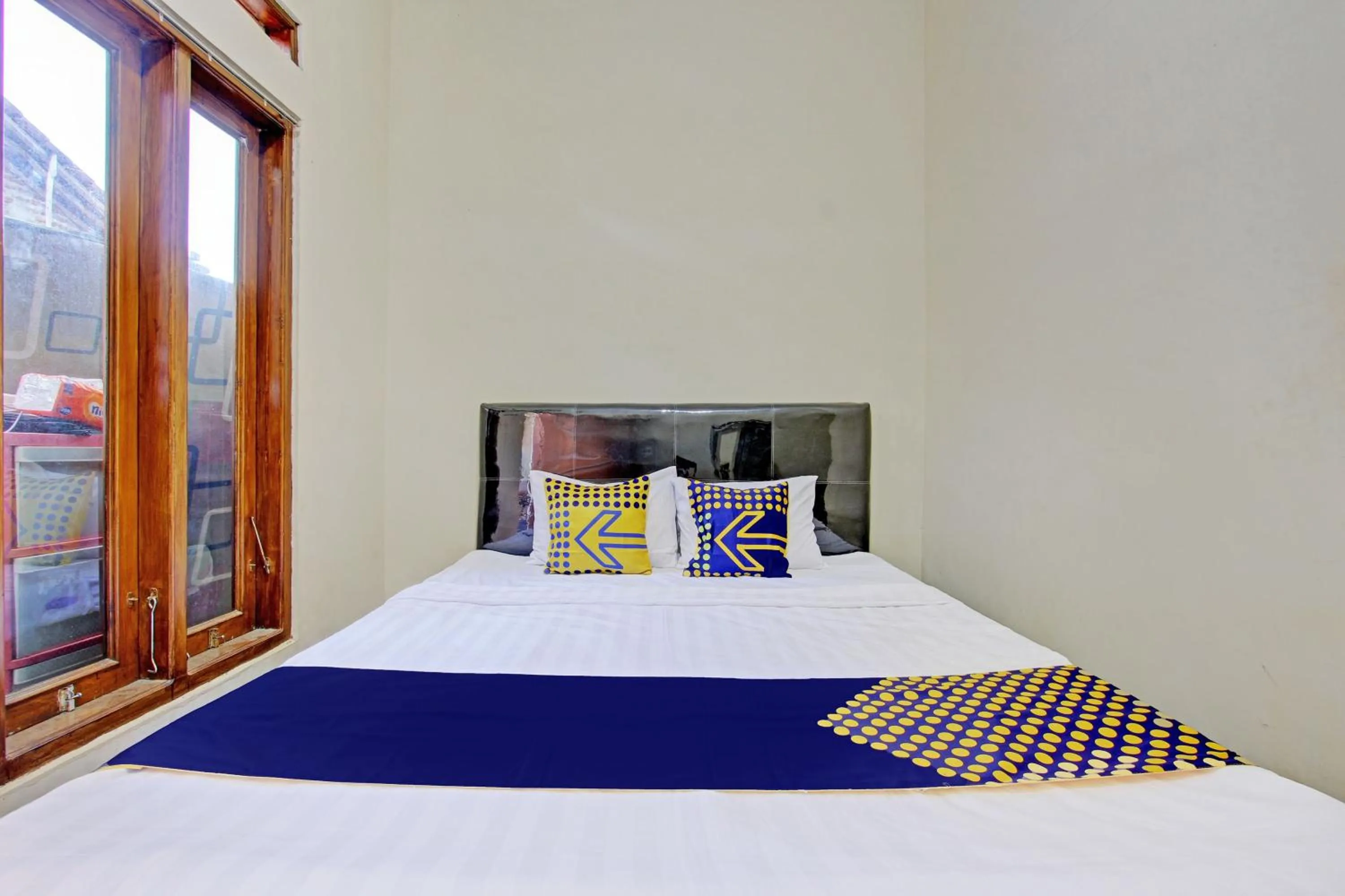 Bedroom in Hotel O Guest House Cemara 1 Syariah
