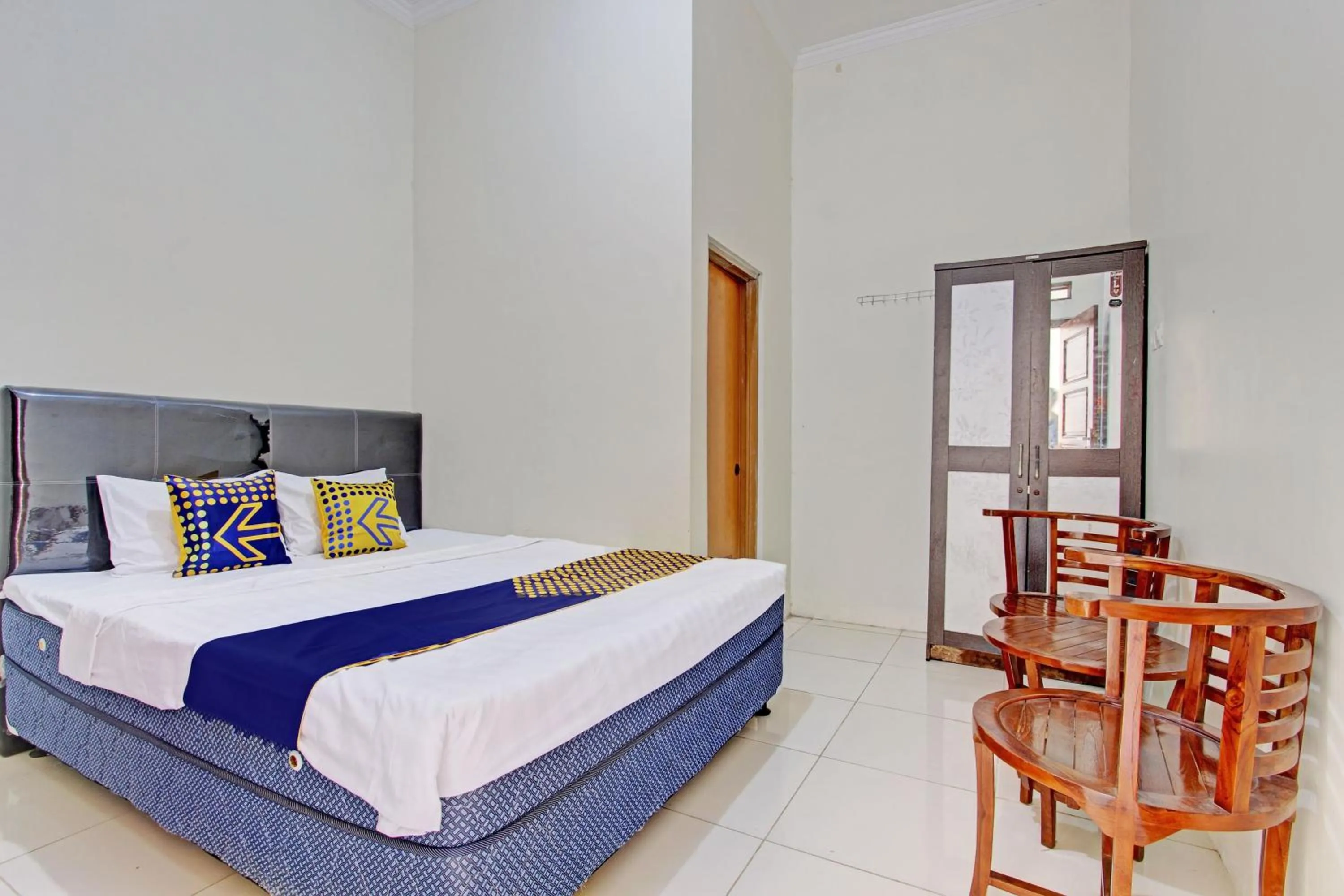Bedroom in Hotel O Guest House Cemara 1 Syariah