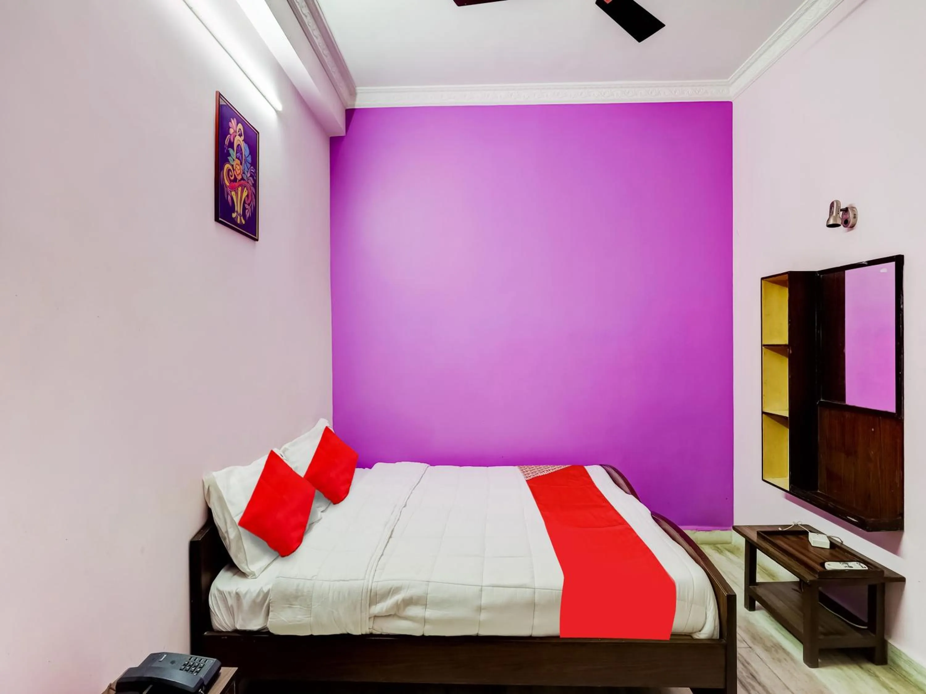 Bedroom in Hotel O Jayam Residency