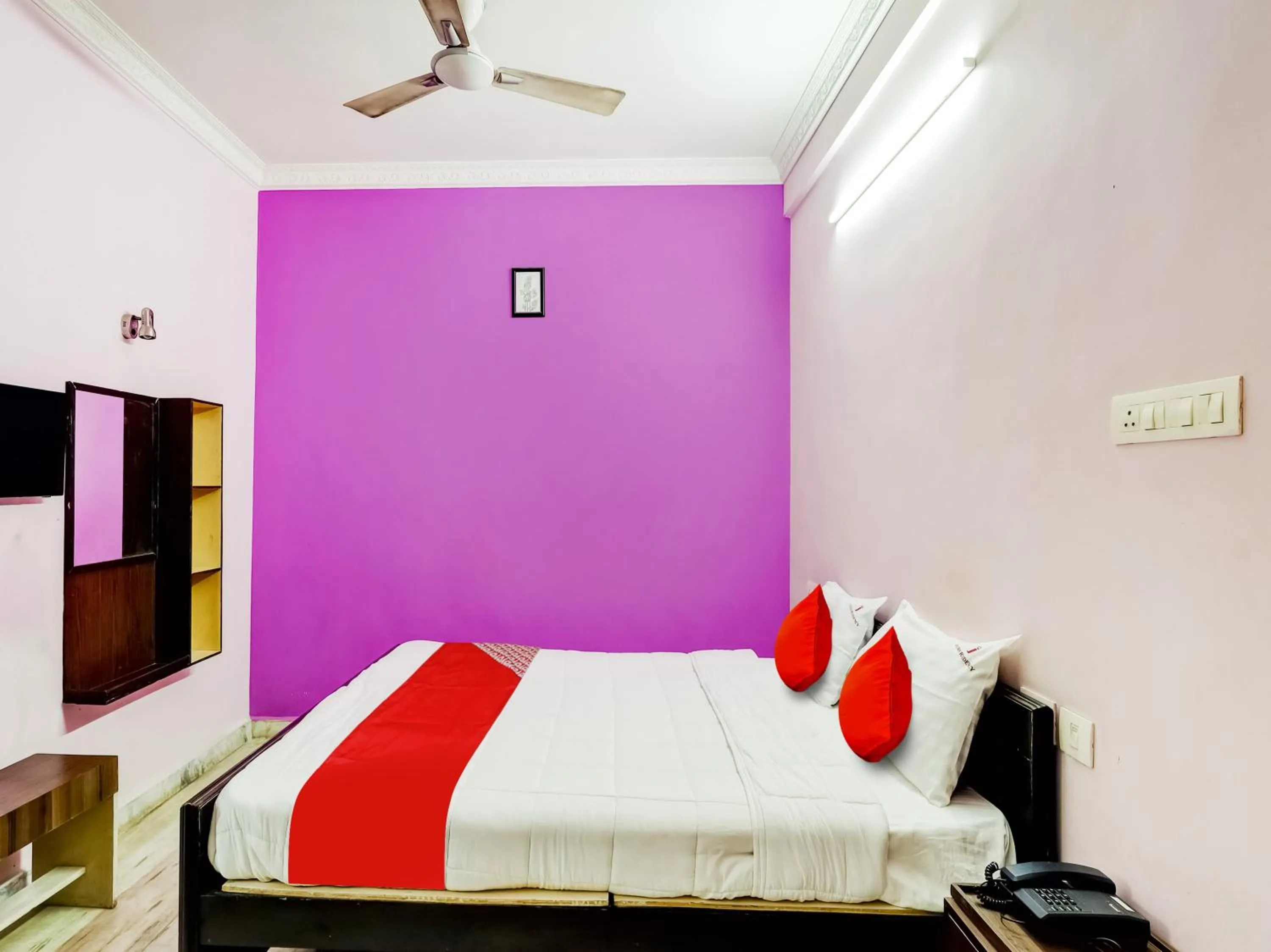 Bedroom in Hotel O Jayam Residency