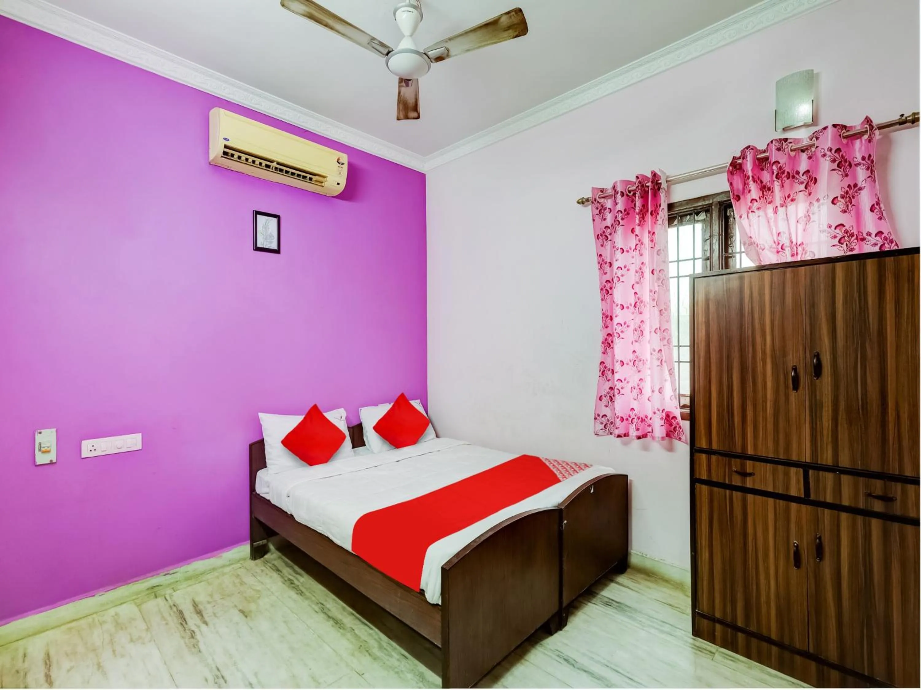 Bedroom in Hotel O Jayam Residency