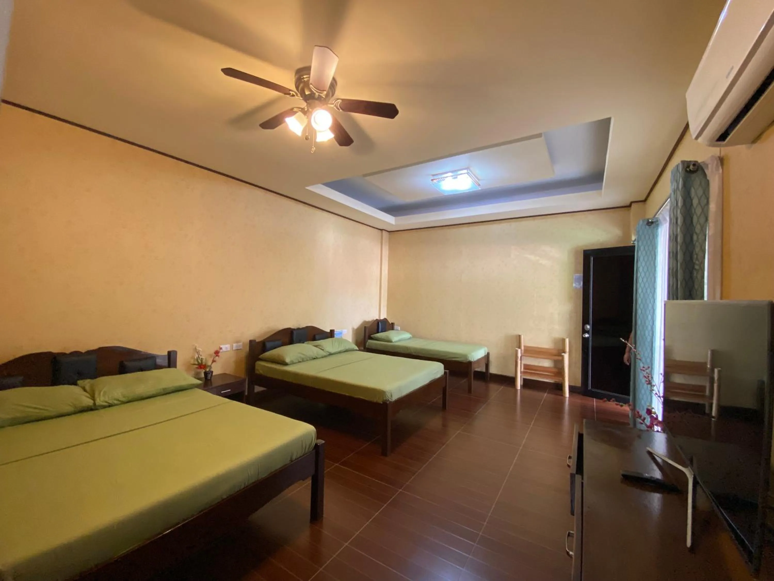 Photo of the whole room, Bed in MinshukuKCS Hotel and Restaurant